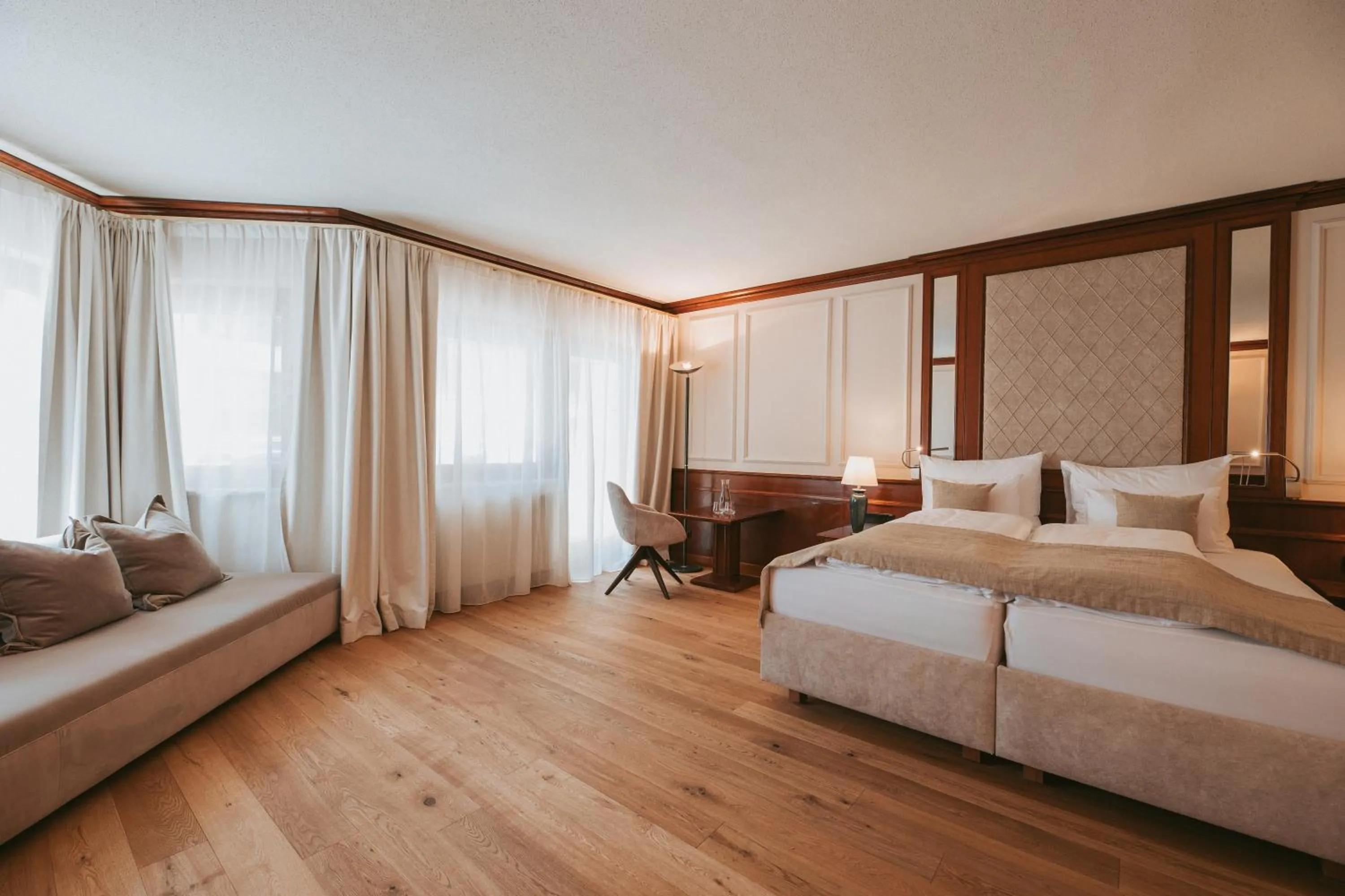 Bed in MANNI das Hotel