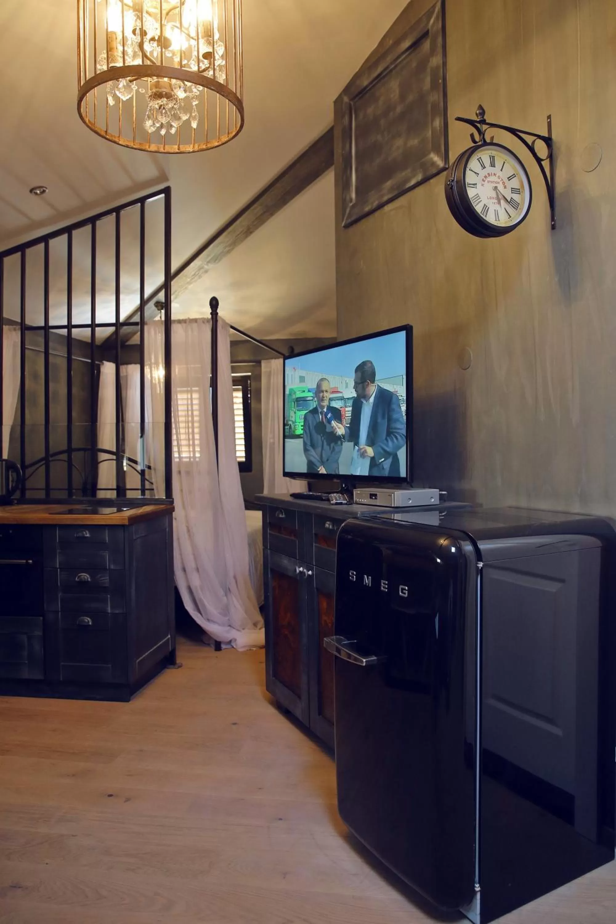 TV and multimedia in Central Apartments Integrated Hotel