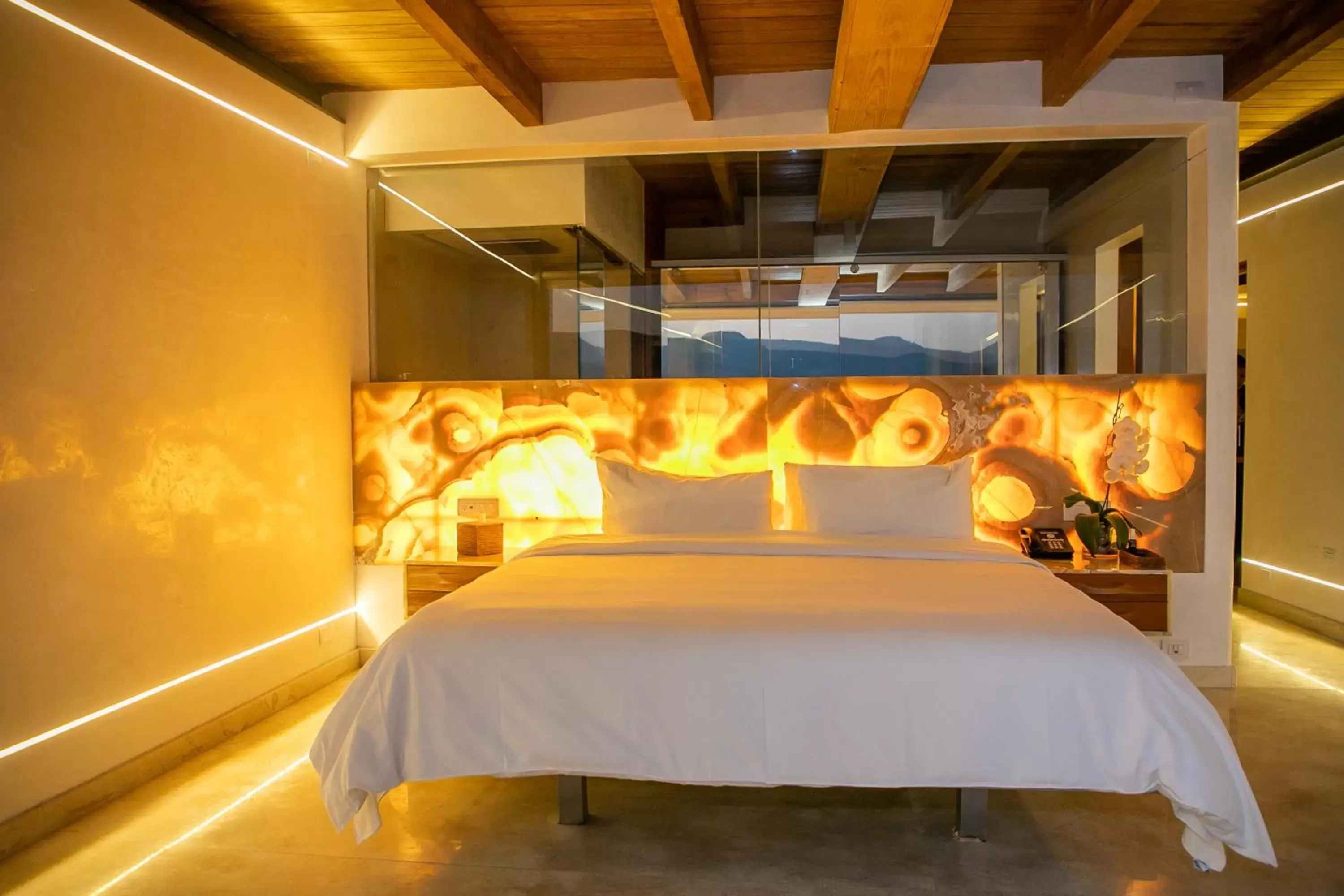 Bed in El Santuario Resort & Spa