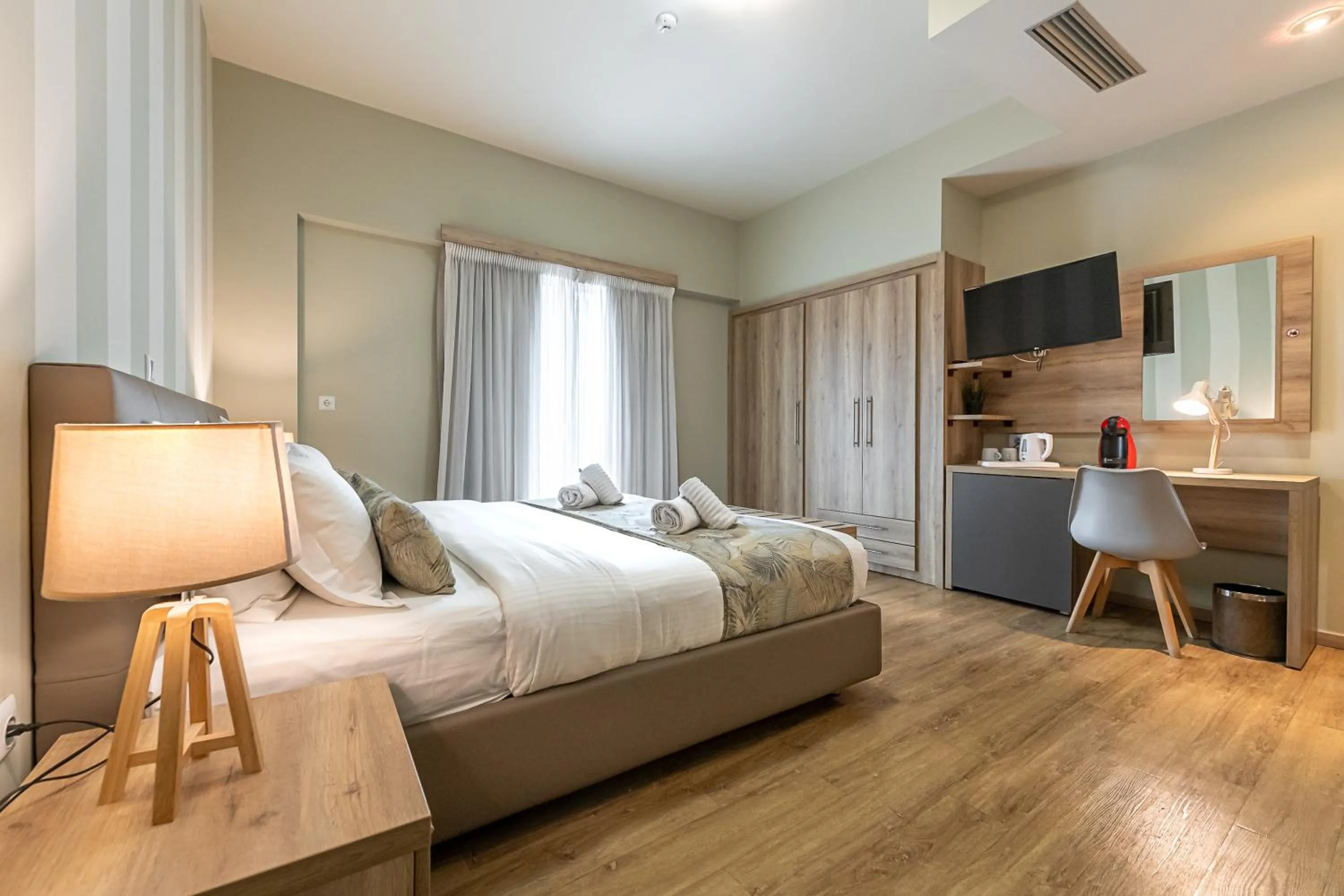 Bed in Hotel @Syngrou Fix