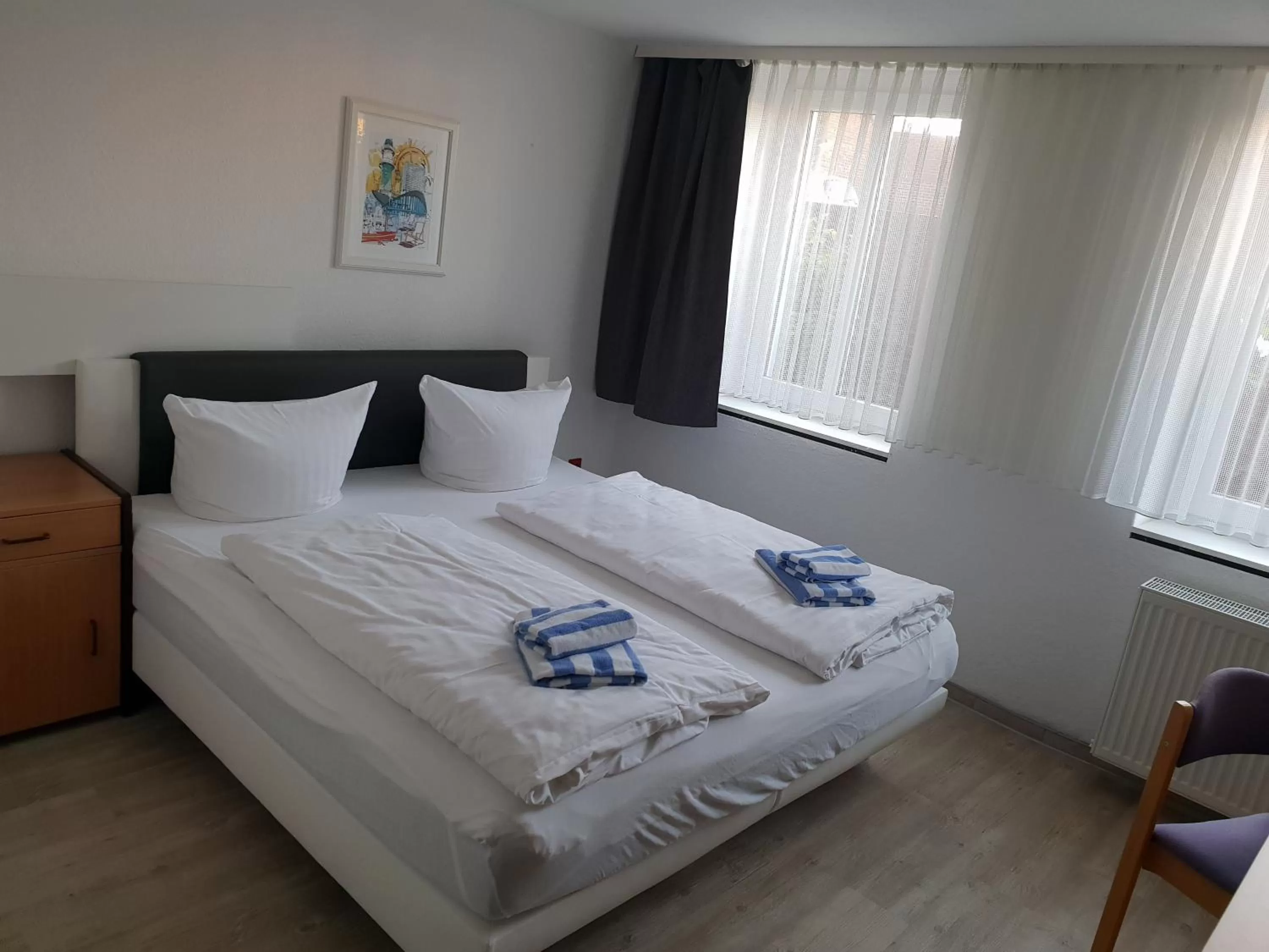 Bed in Appartement-Hotel Rostock