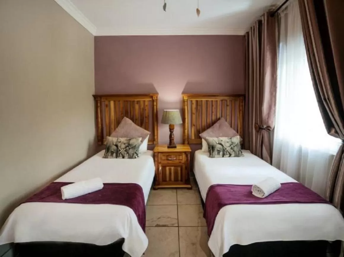 Bed in Ivory Tusk Lodge