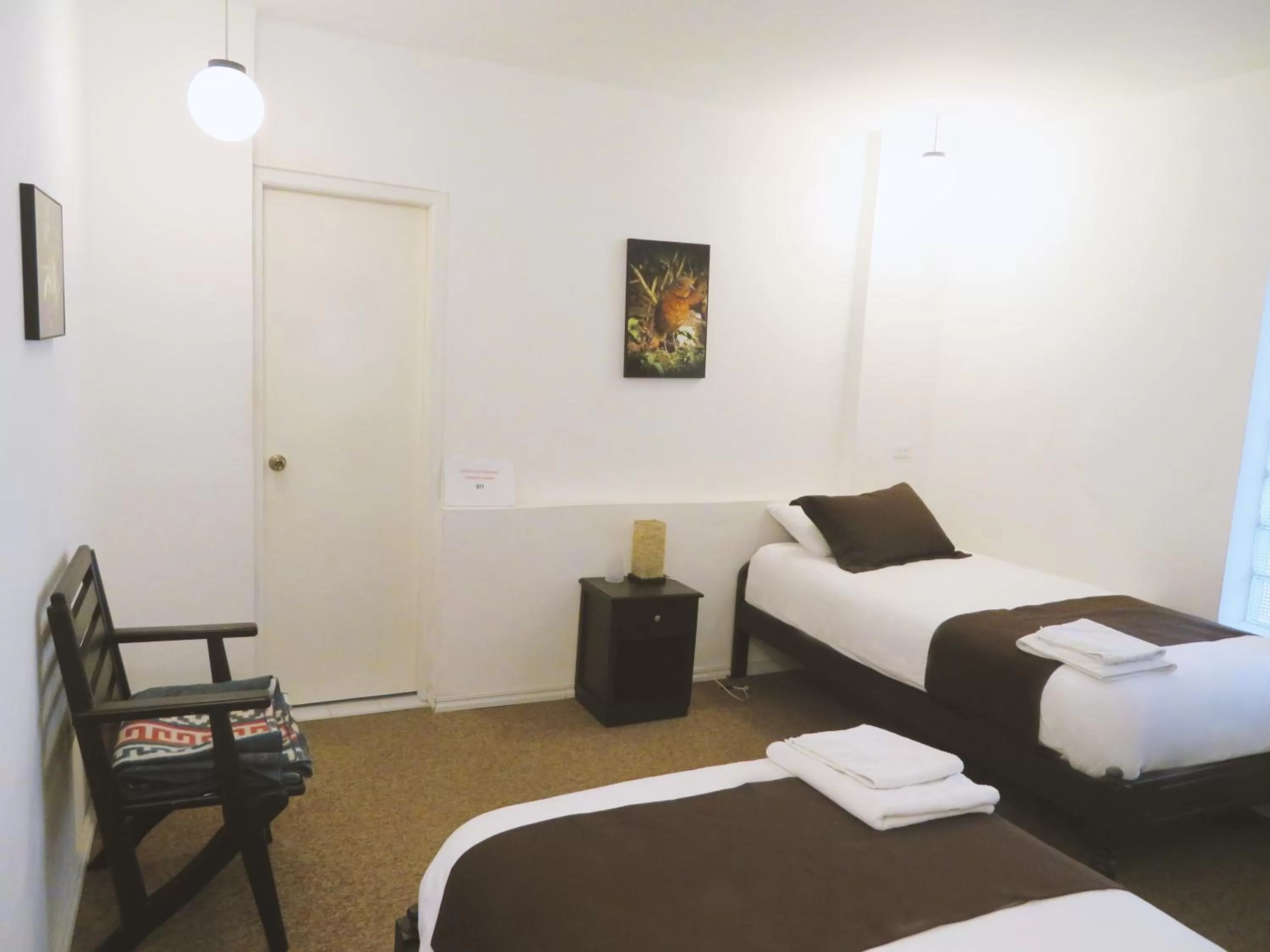 Bed in Bird Garden Guest House