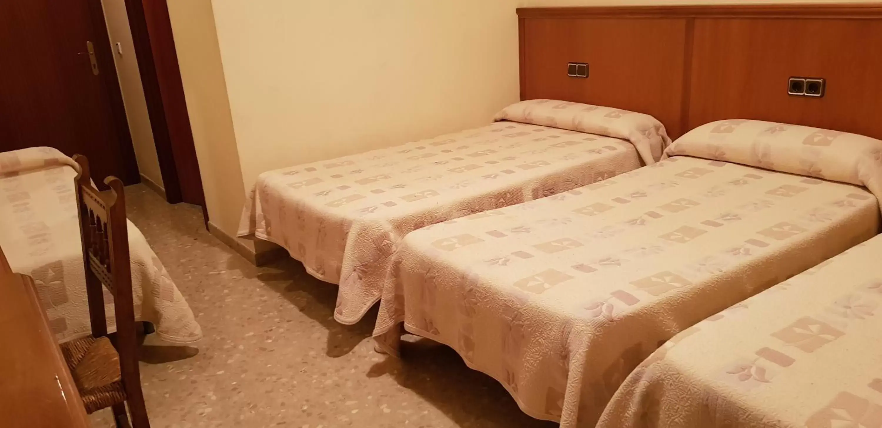 Bed in Hotel Reina Isabel