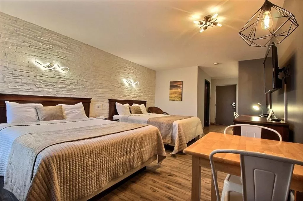 Bed in Hotel Motel Le Quiet