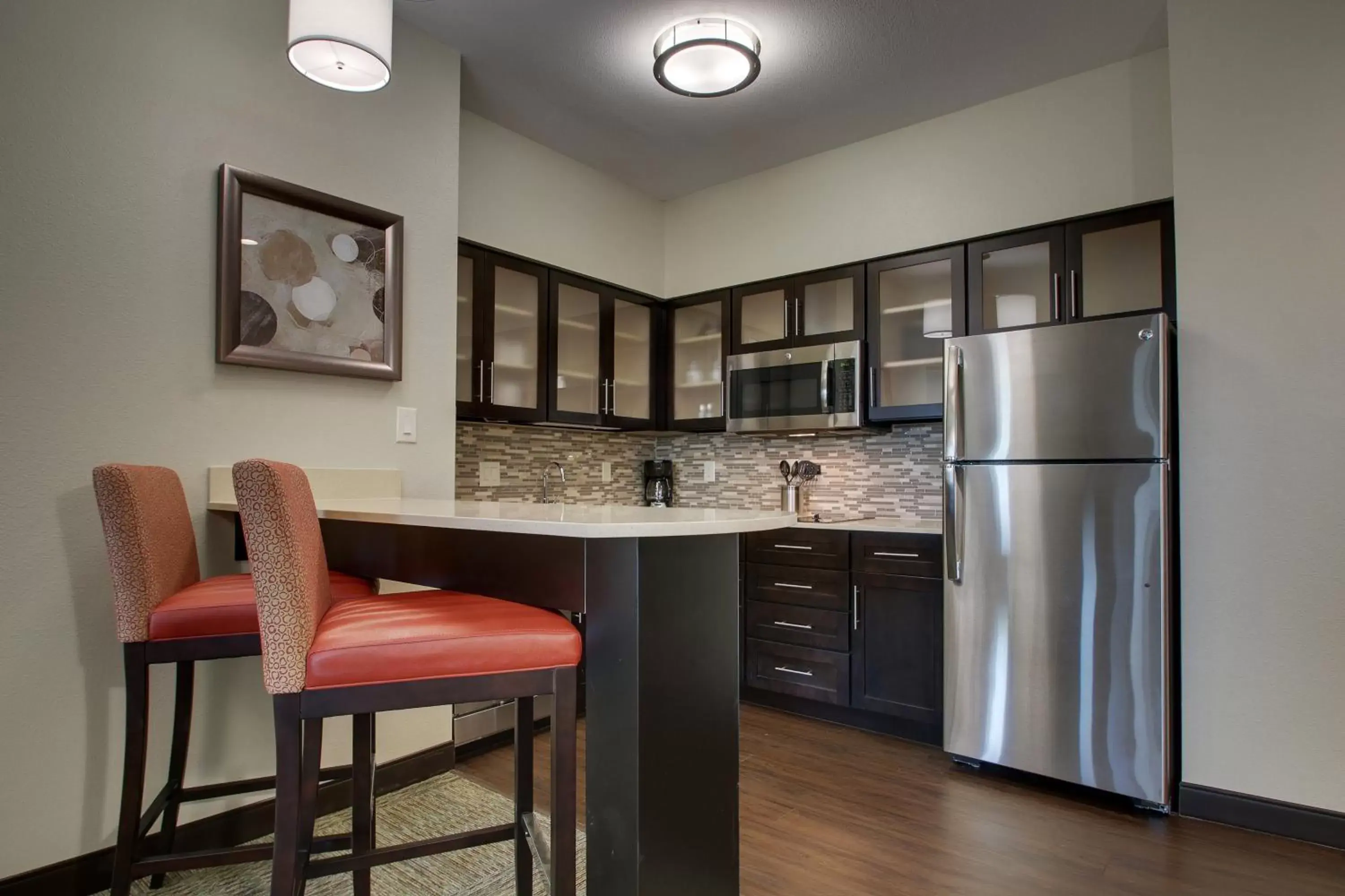 Photo of the whole room, Kitchen/Kitchenette in Staybridge Suites Plano - The Colony, an IHG Hotel