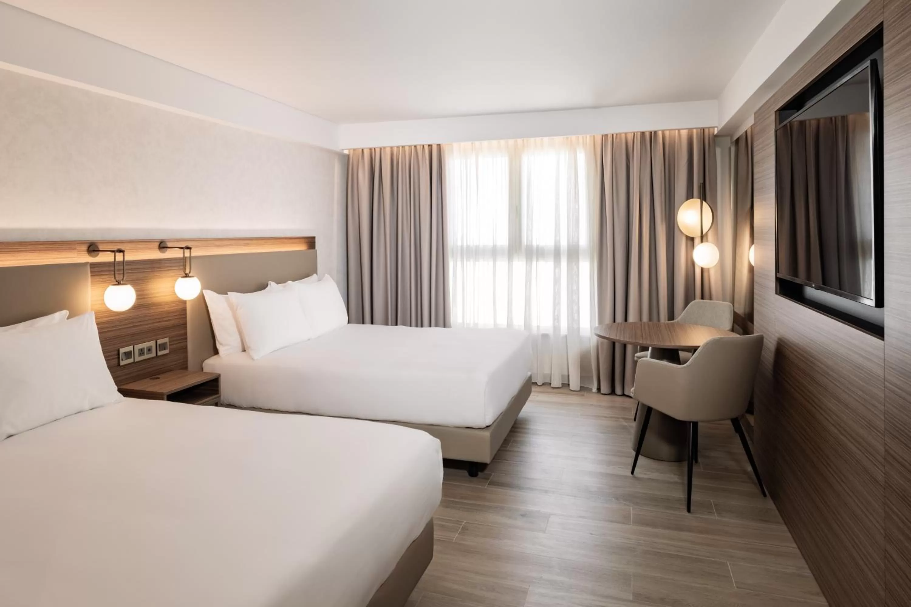 Deluxe Double Room with Two Double Beds, Balcony and City View in AC Hotel by Marriott St Julian's