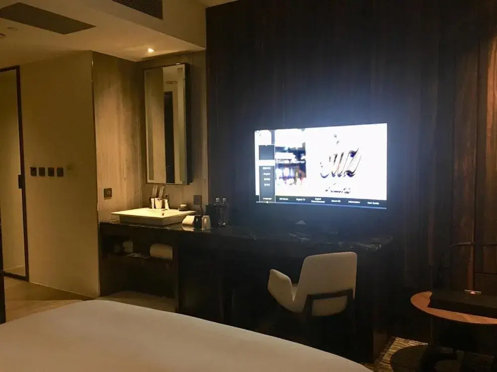 TV and multimedia, TV/Entertainment Center in Suz Hotel