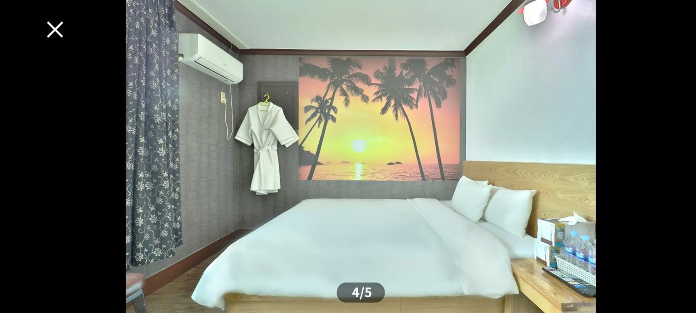 Bed in Saipan Motel with Sea View