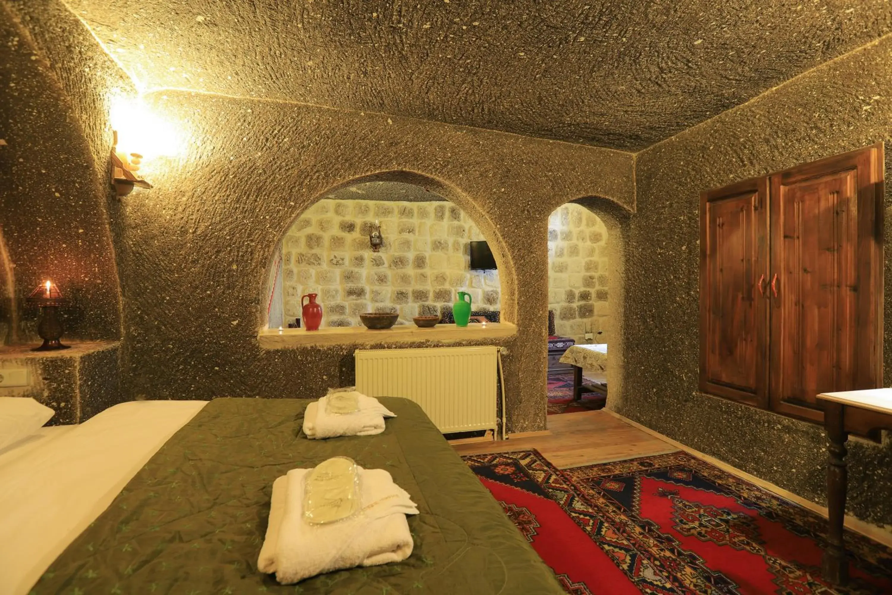 Massage, Bed in Antique Terrace Cave Suites Massage, Bed in Antique Terrace Cave Suites