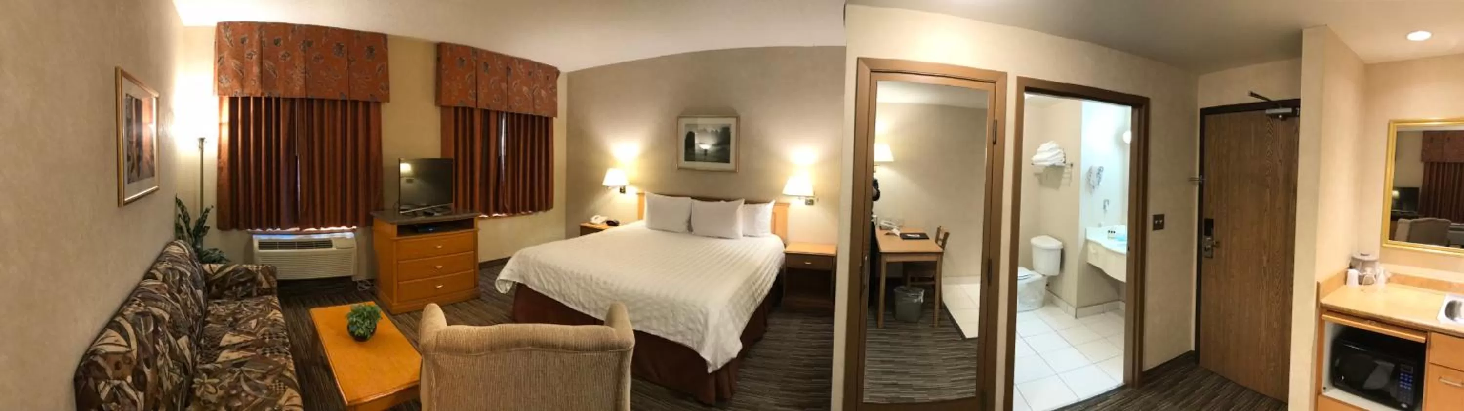 Bed in Humphry Inn and Suites