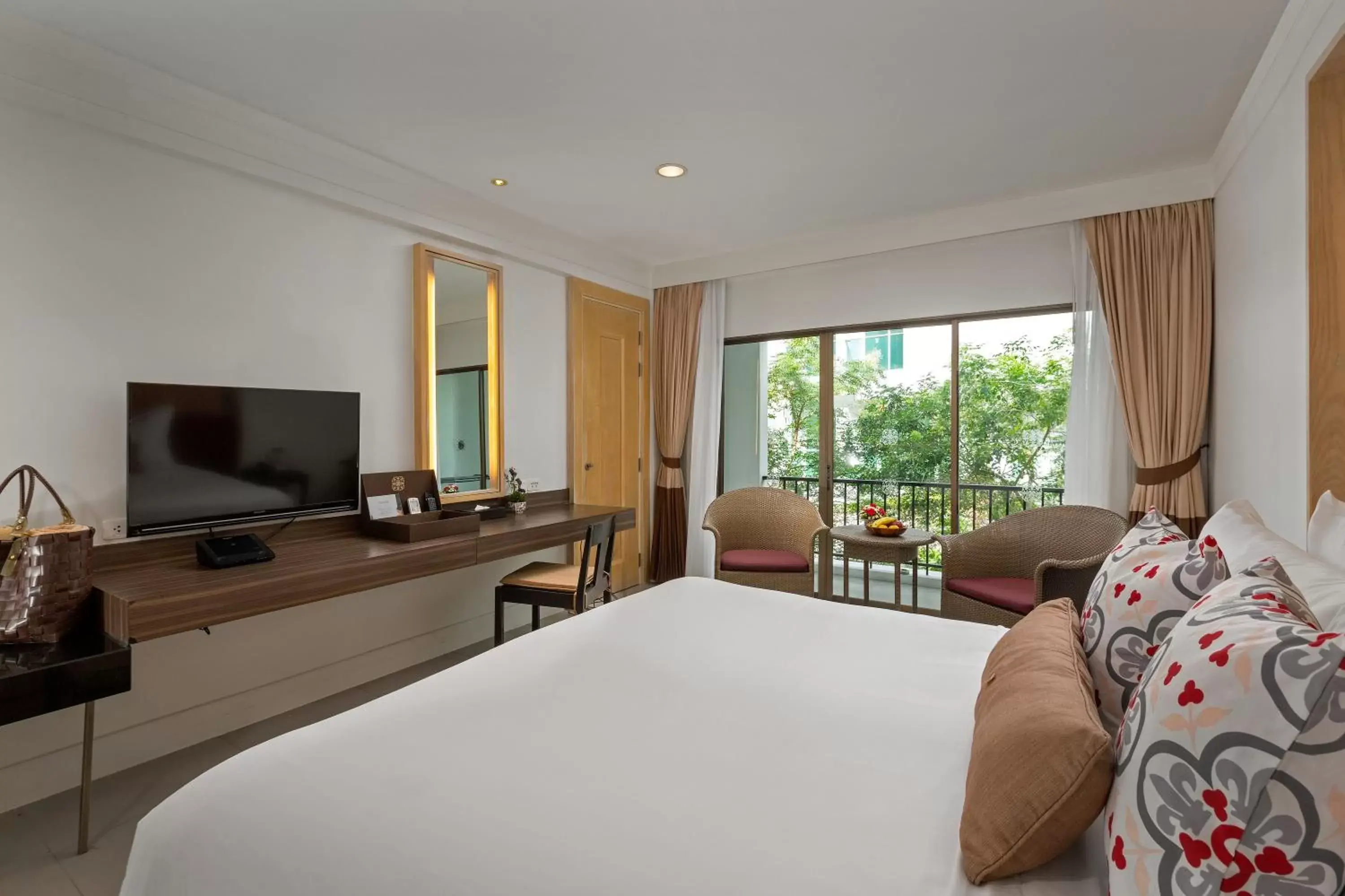 Bedroom in Sawaddi Patong Resort & Spa by Tolani - SHA Extra Plus