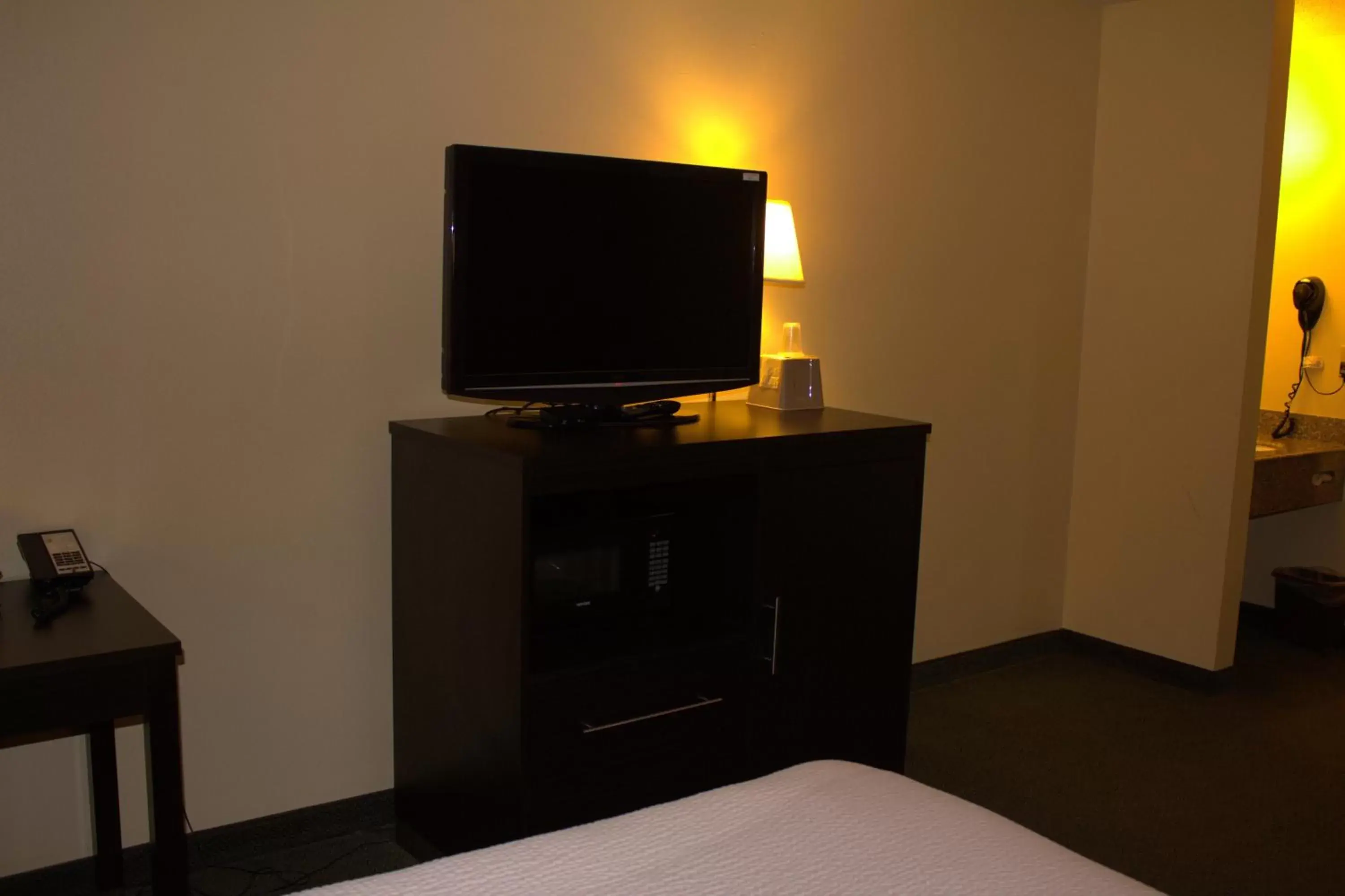 Bed in Super 8 by Wyndham Colby Bed in Super 8 by Wyndham Colby