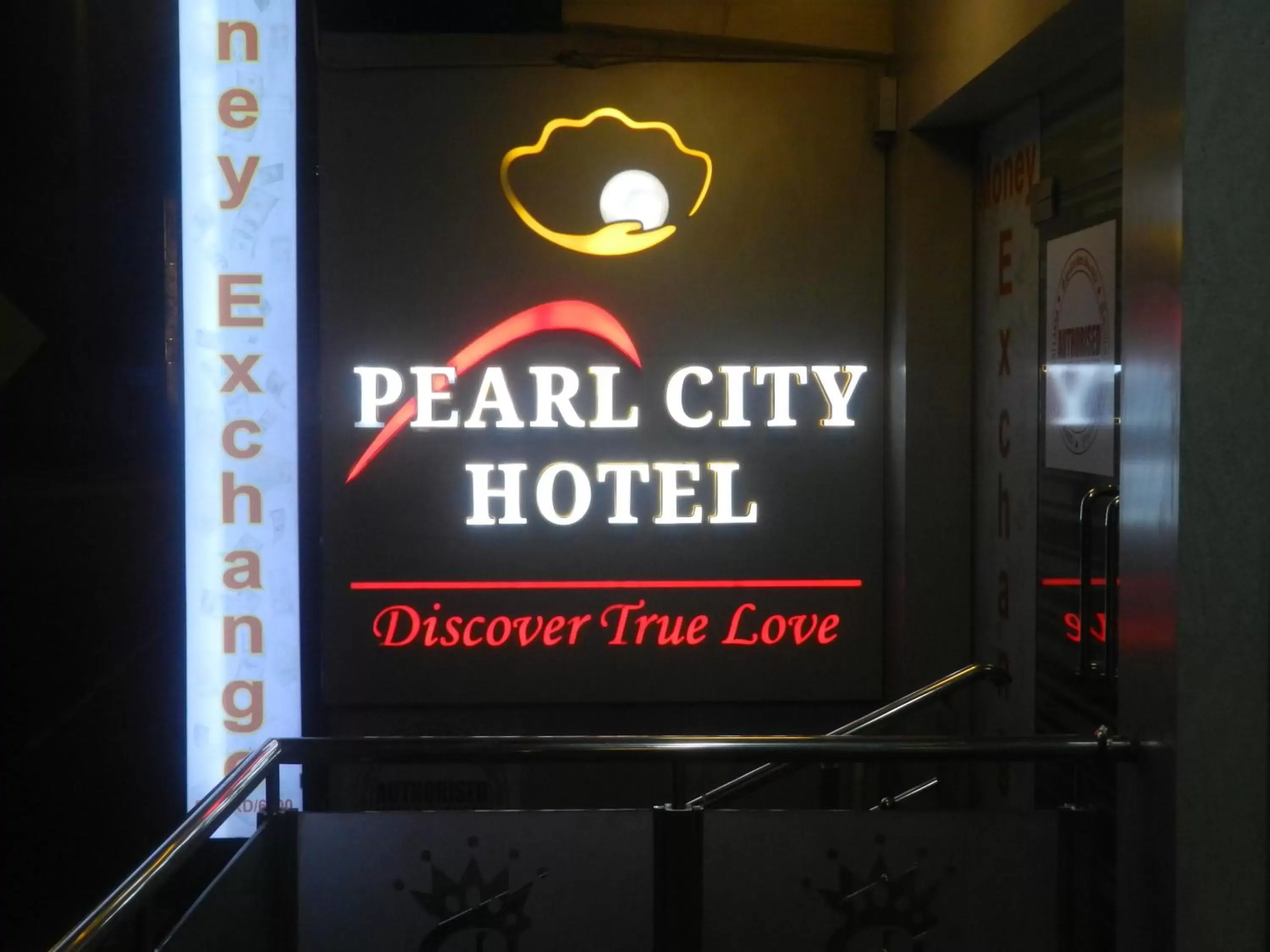 Property logo or sign in Pearl City Hotel