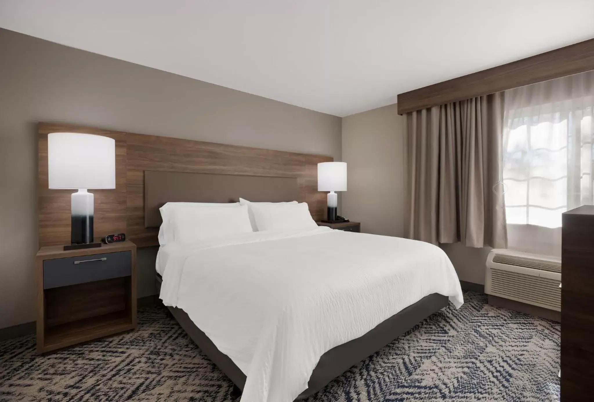 Photo of the whole room, Bed in Candlewood Suites Lafayette, an IHG Hotel