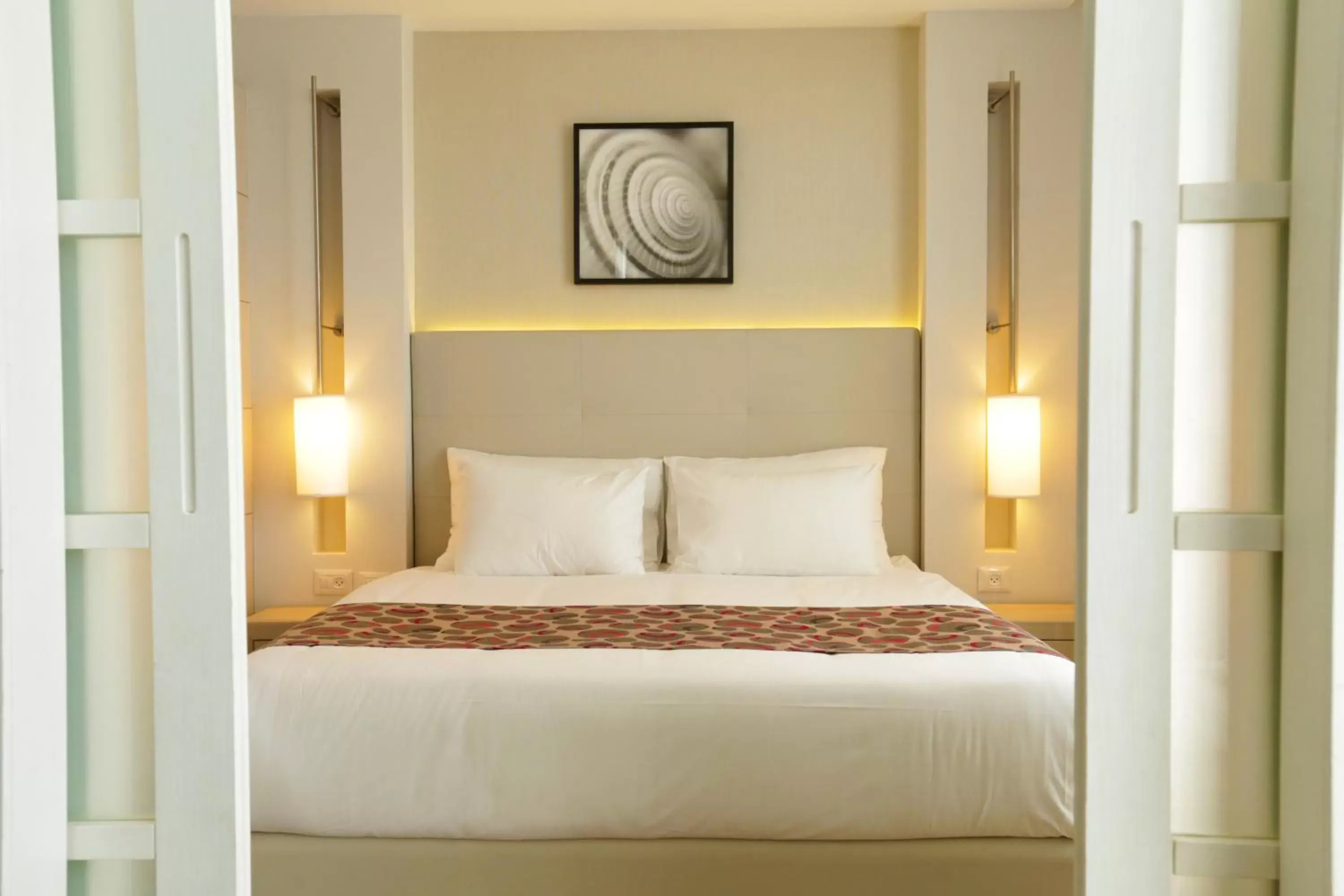 Bed in Astral Maris Hotel