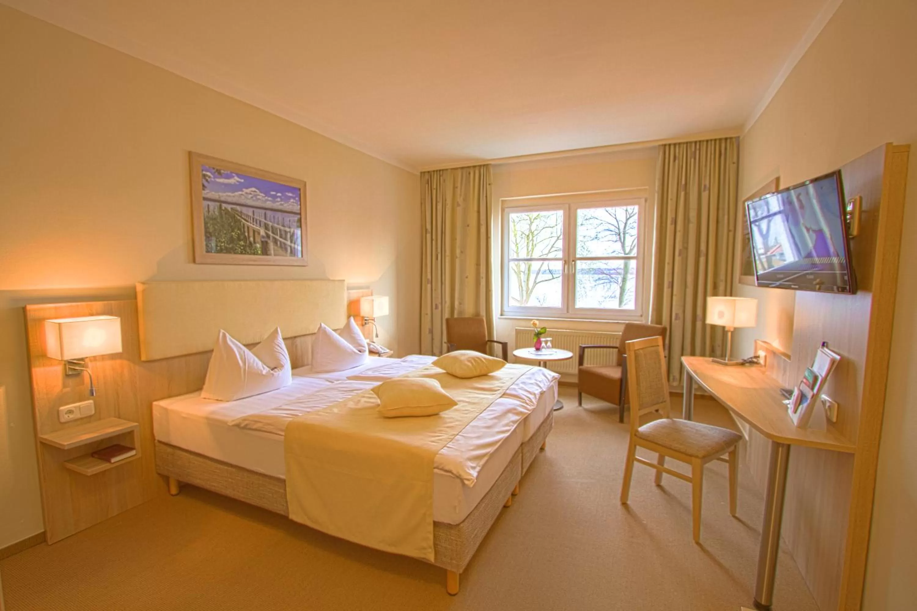 Photo of the whole room, Bed in Falk Seehotel Plau am See