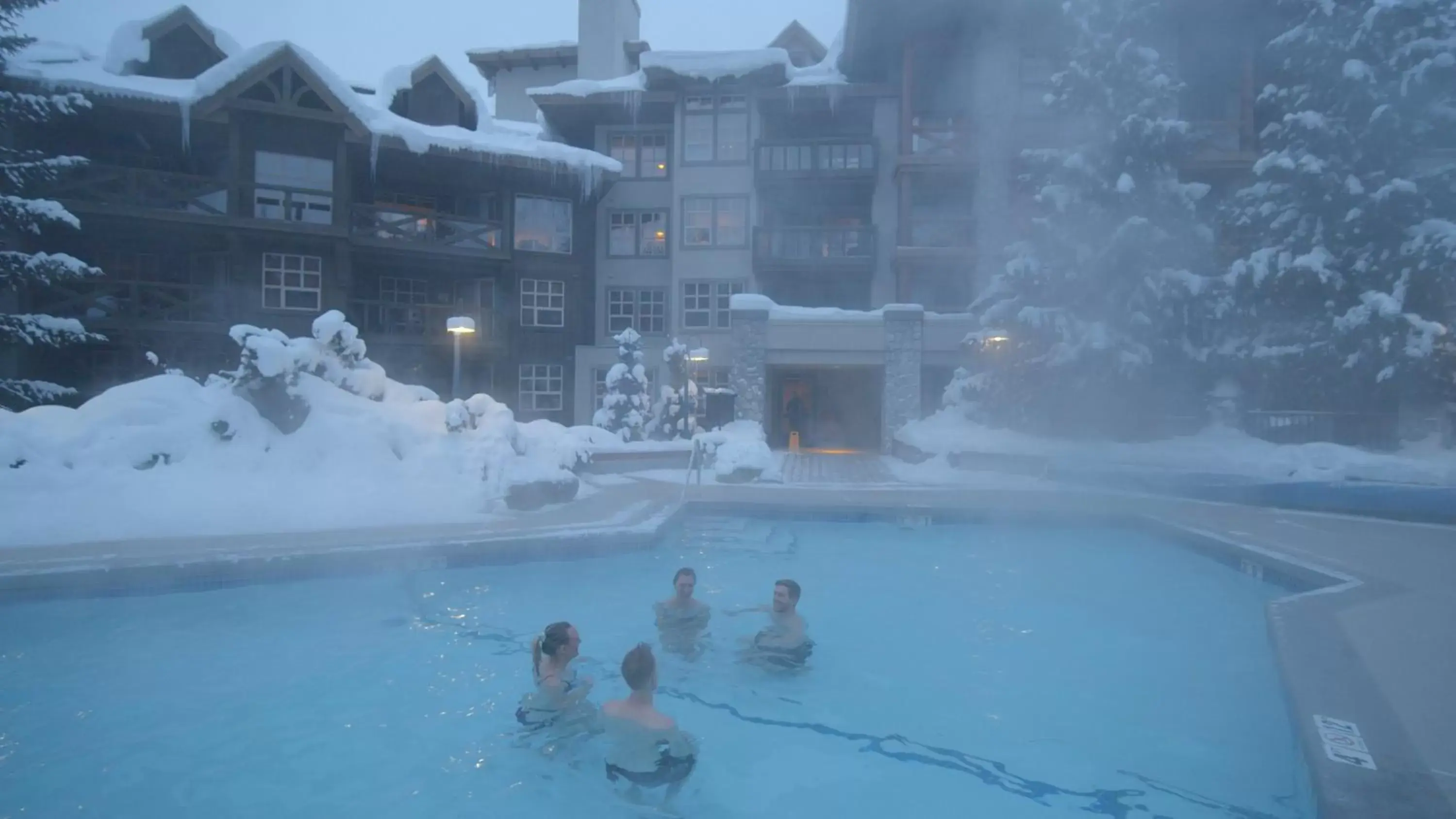Winter, Swimming Pool in Blackcomb Springs Suites by CLIQUE
