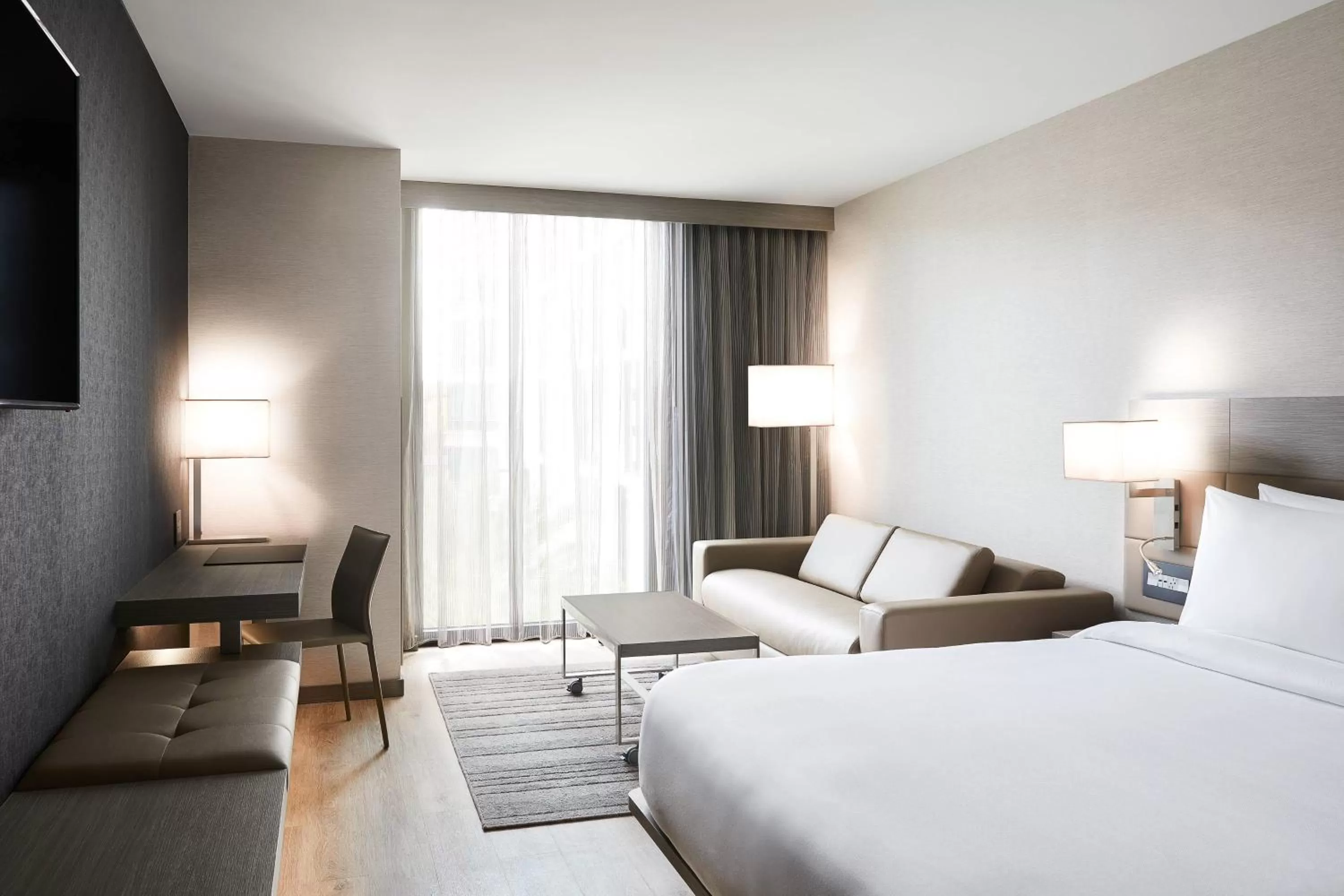 Photo of the whole room, Bed in AC Hotel by Marriott Tampa Airport