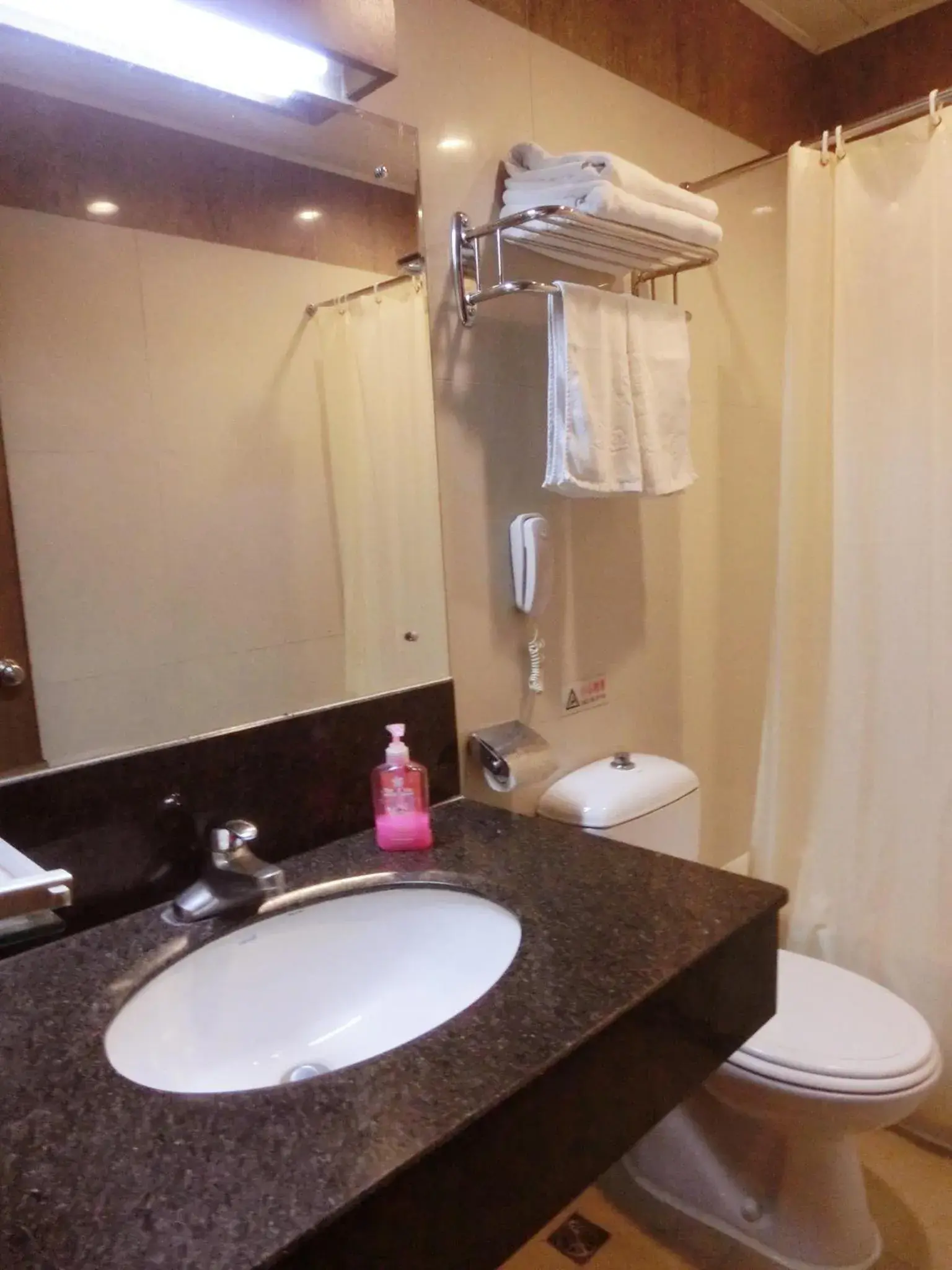 Toilet, Bathroom in New Asia Hotel