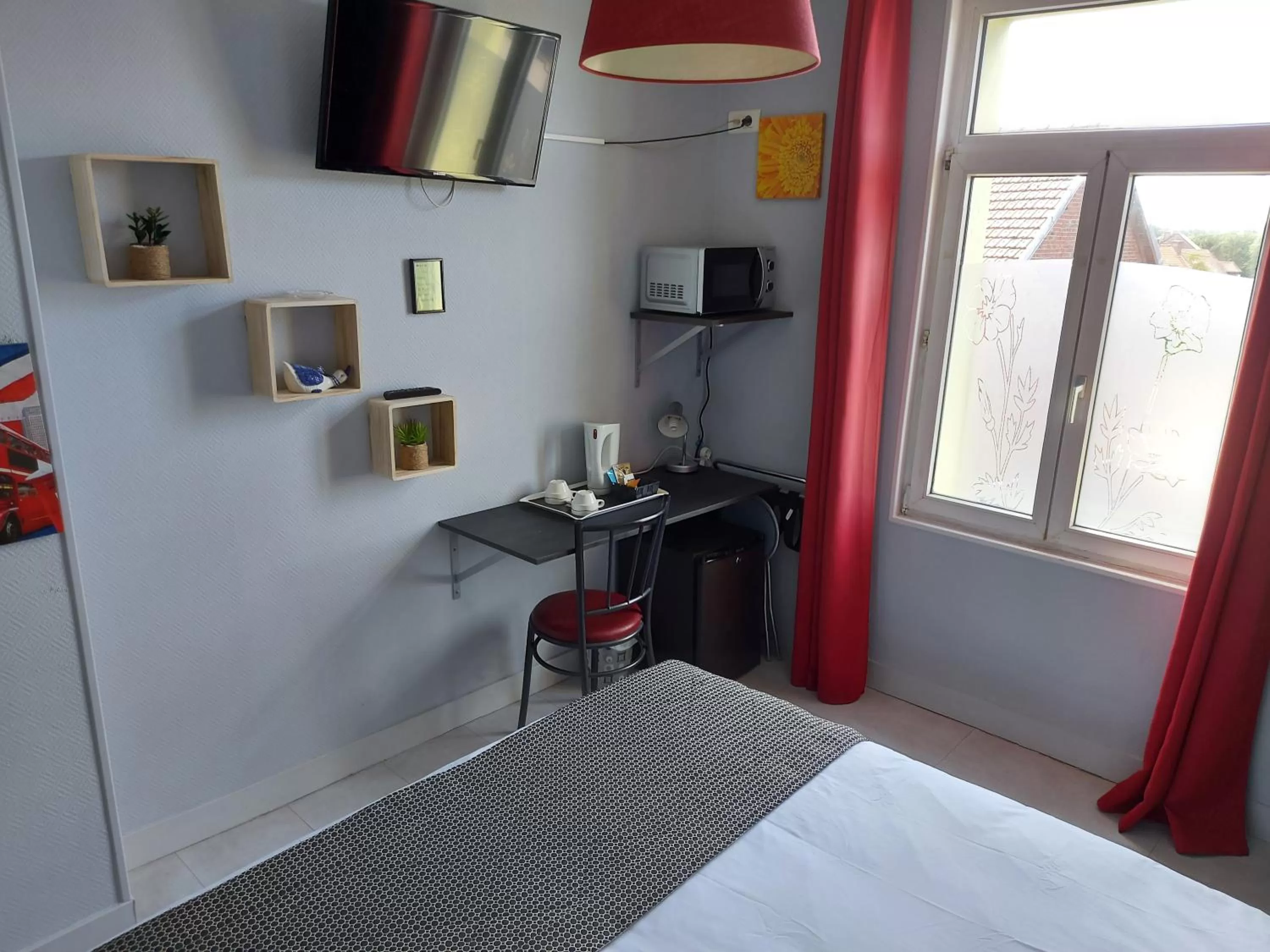 Bed in Hotel De La Paix