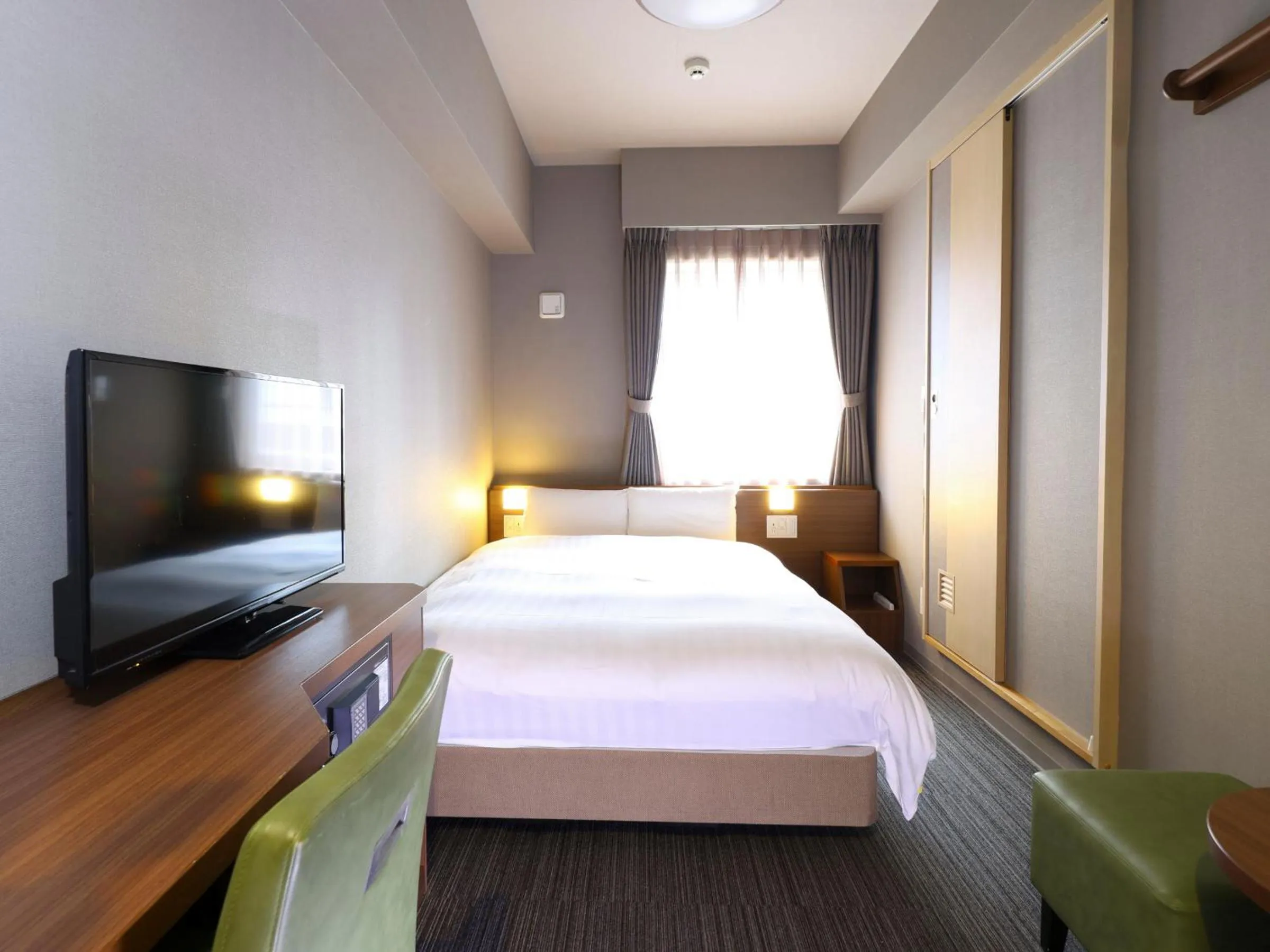 Bed in Dormy Inn Tokyo Hatchobori - Natural Hot Spring