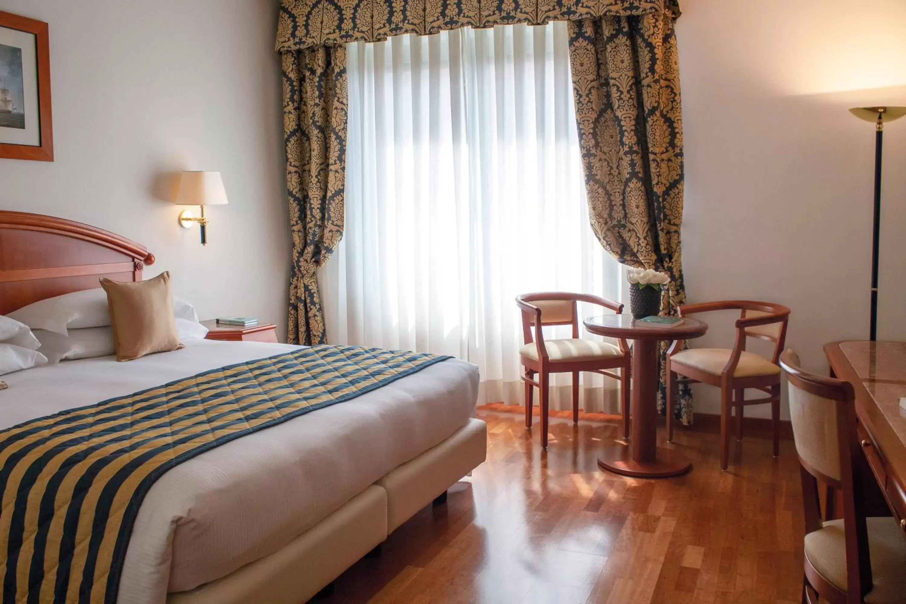 Bed in Starhotels Vespucci