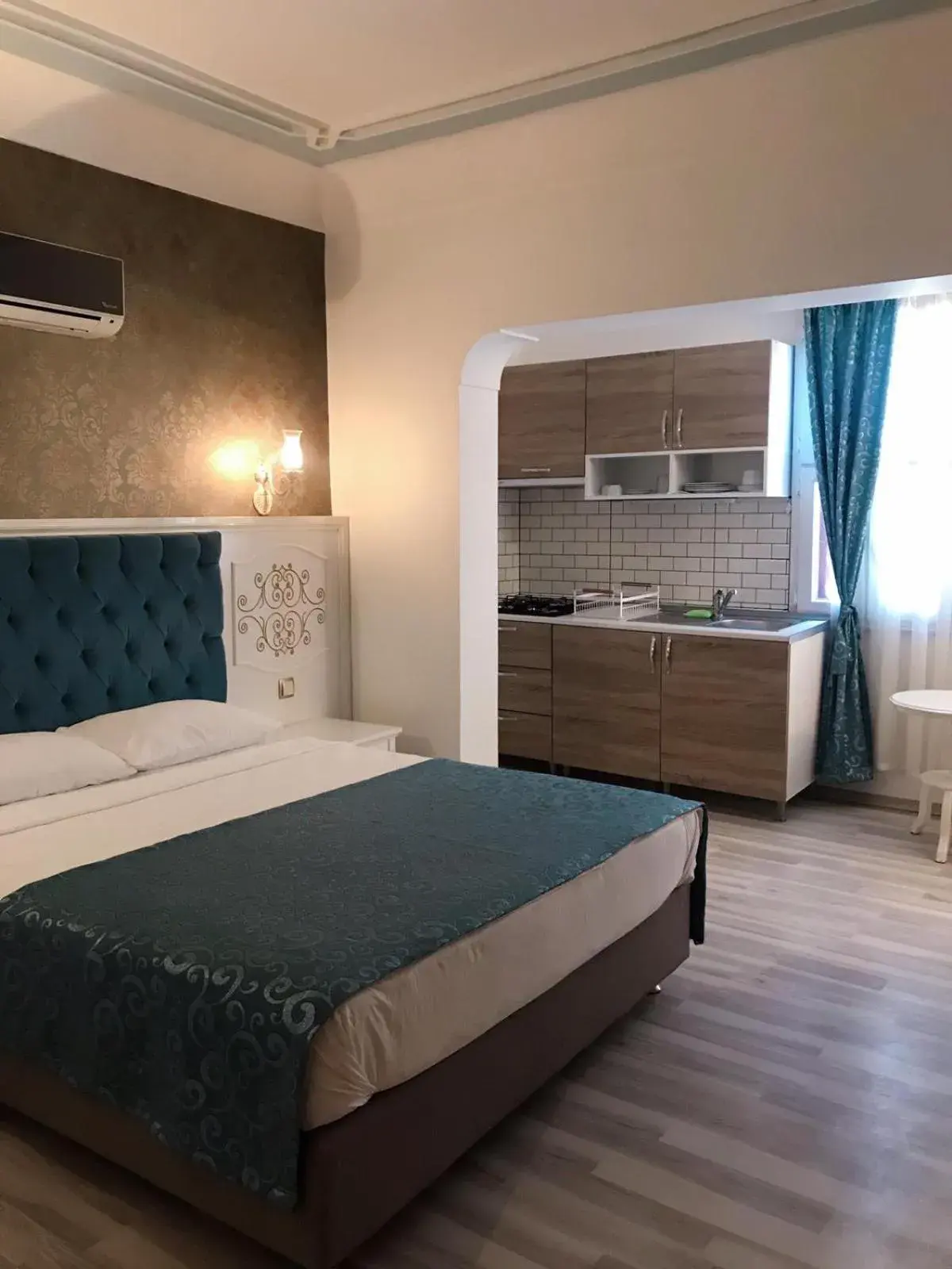 Kitchen or kitchenette, Bed in Urcu Hotel Kitchen or kitchenette, Bed in Urcu Hotel