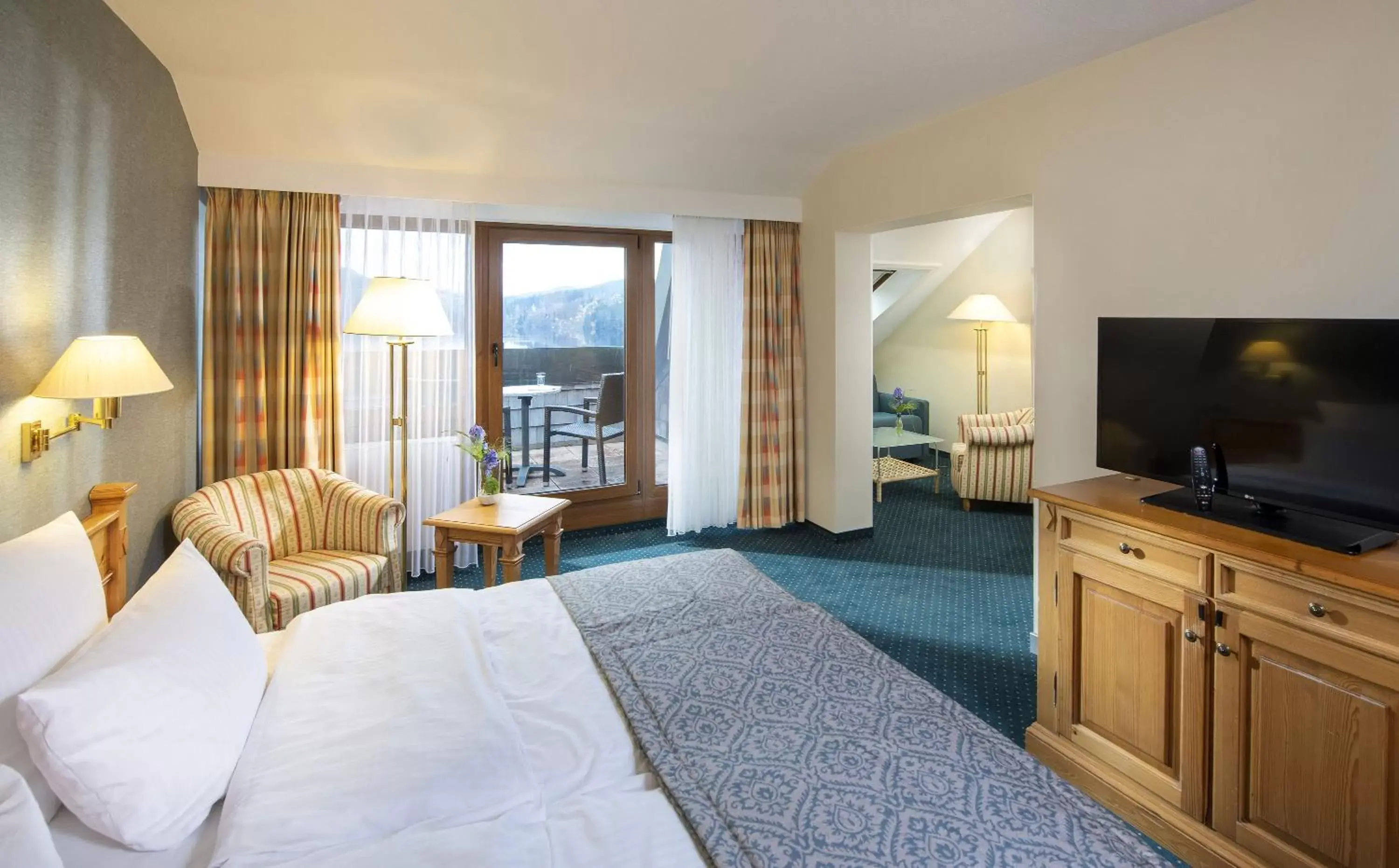 Photo of the whole room, TV/Entertainment Center in Maritim Titisee Hotel