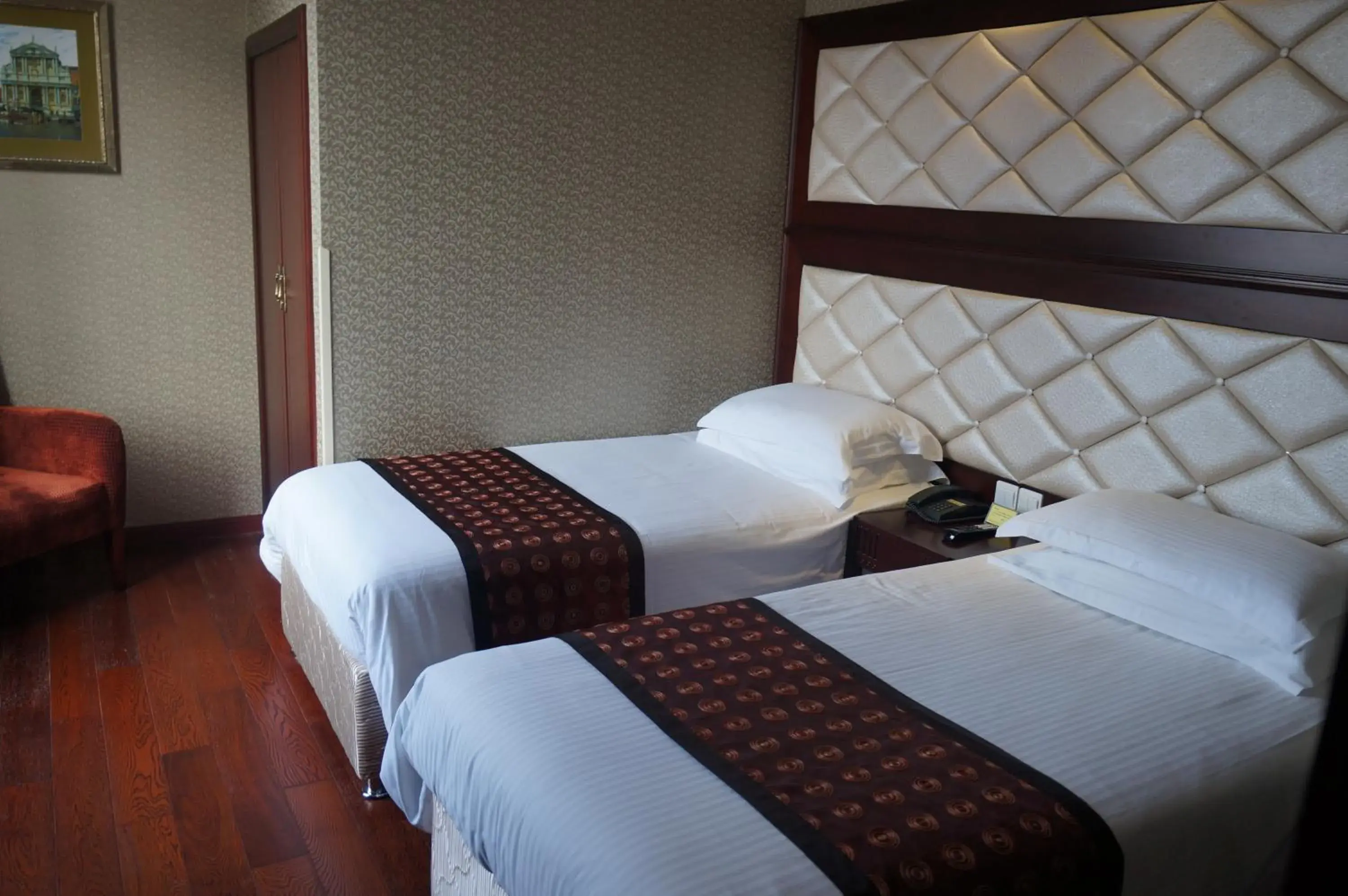 Bed in Seventh Heaven Hotel