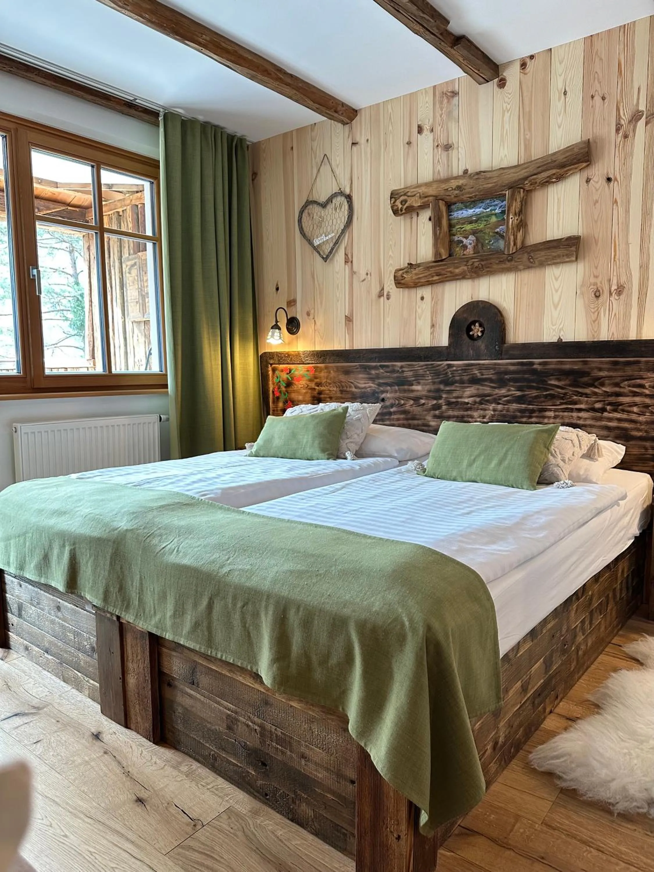 Bed in Ribno Alpine Hotel