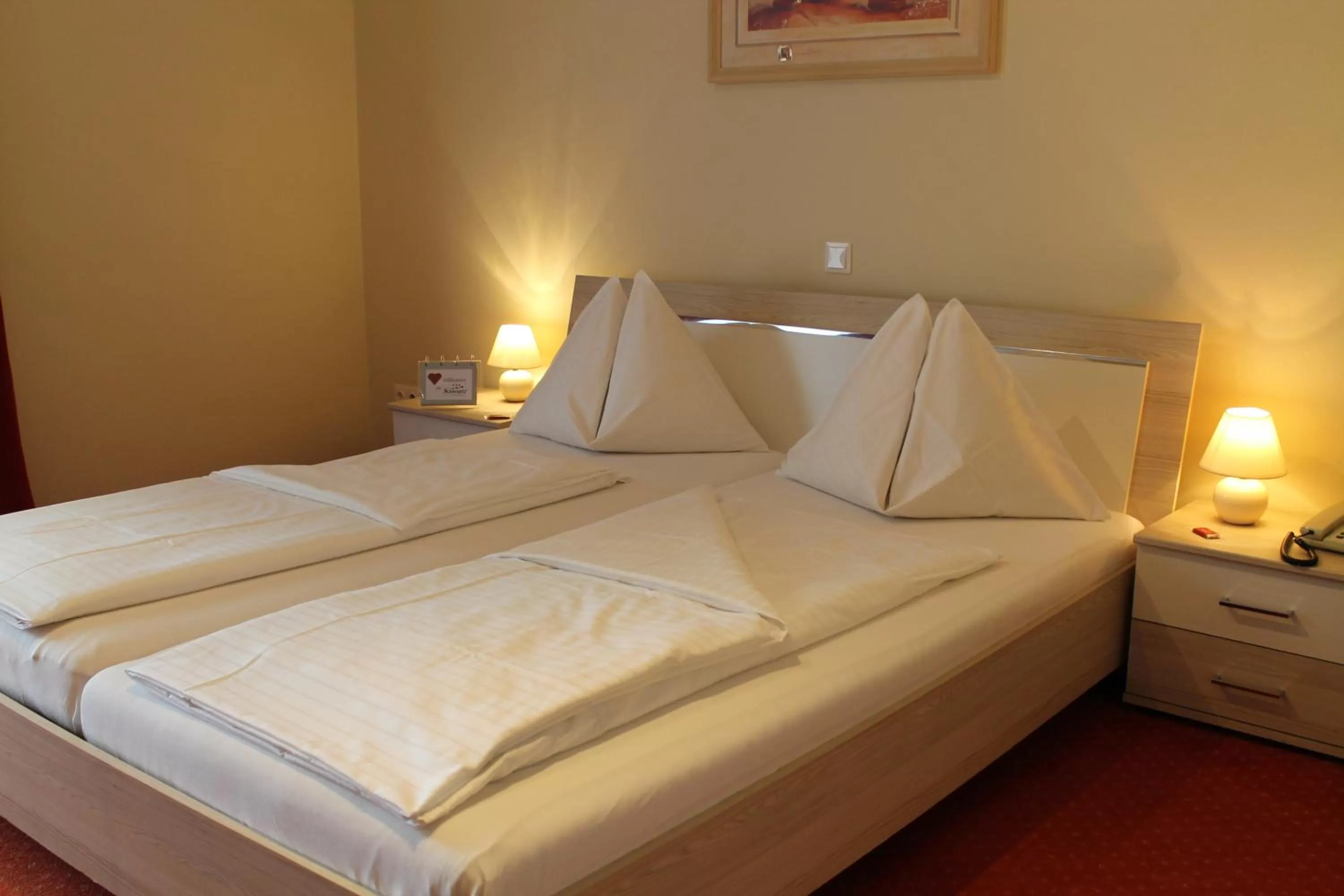 Bed in Hotel Restaurant Schwartz