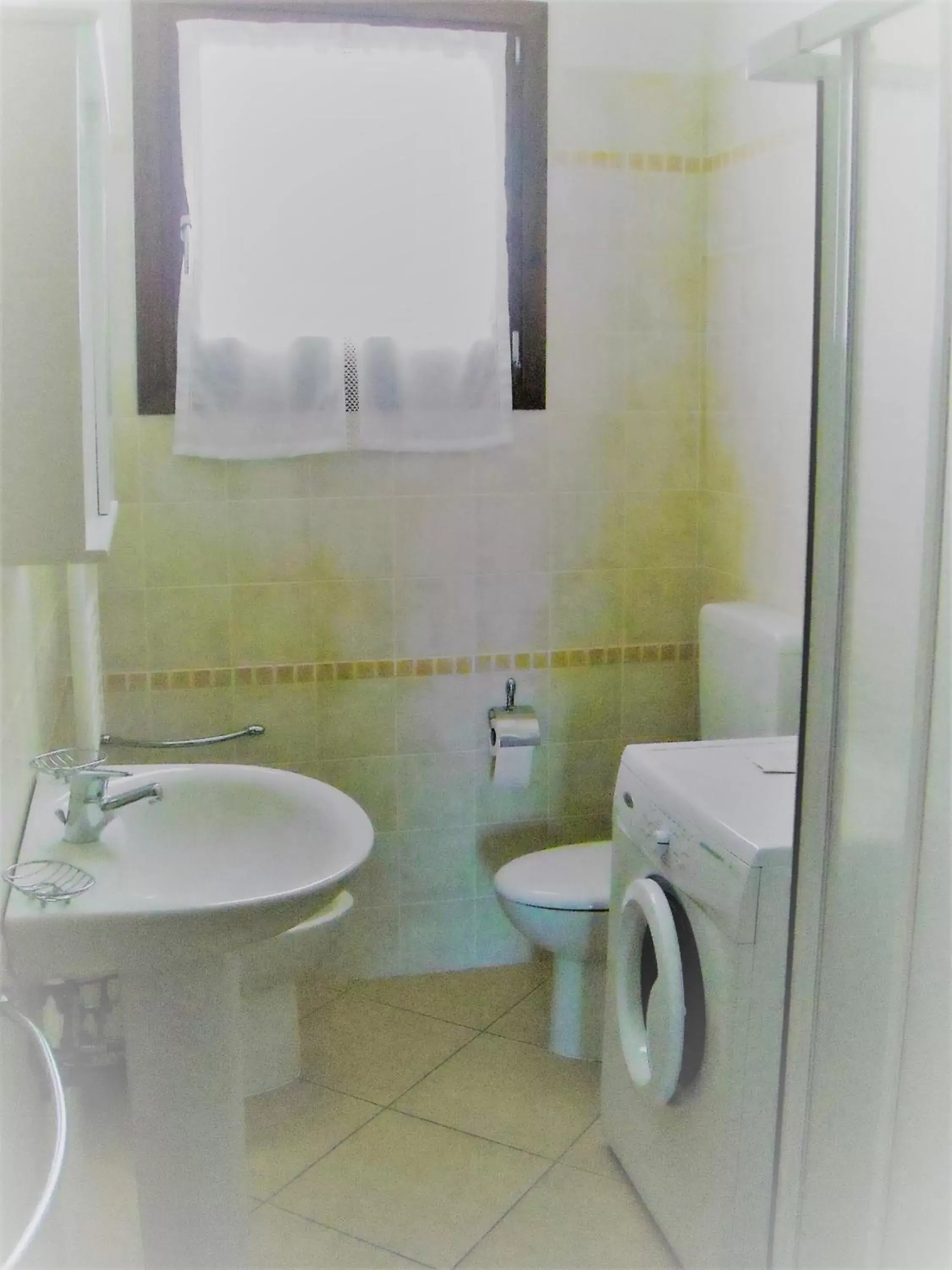 Bathroom in Villaggio dei Fiori Apart- Hotel 3 Stars - Family Resort