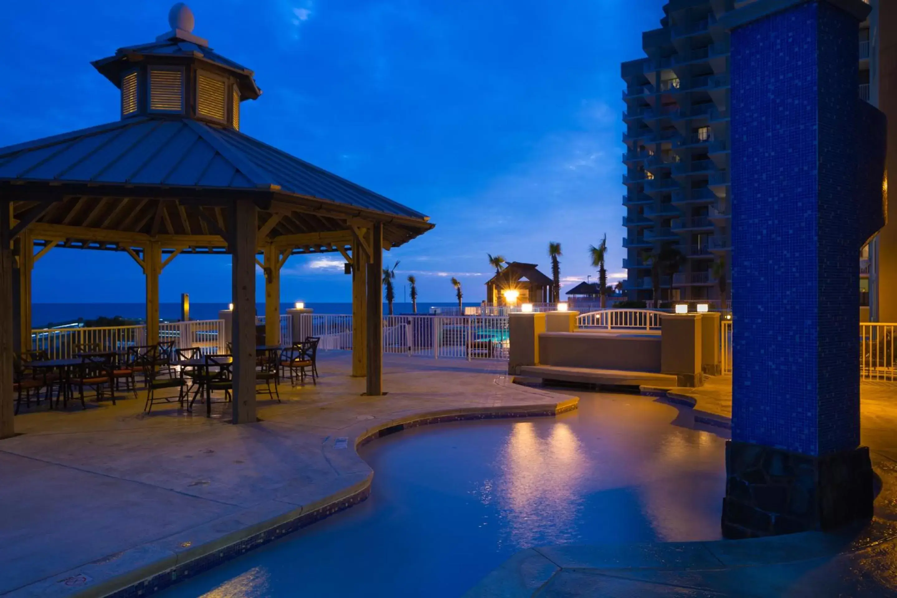Swimming pool in Escapes! To The Shores Orange Beach, A Ramada by Wyndham Swimming pool in Escapes! To The Shores Orange Beach, A Ramada by Wyndham