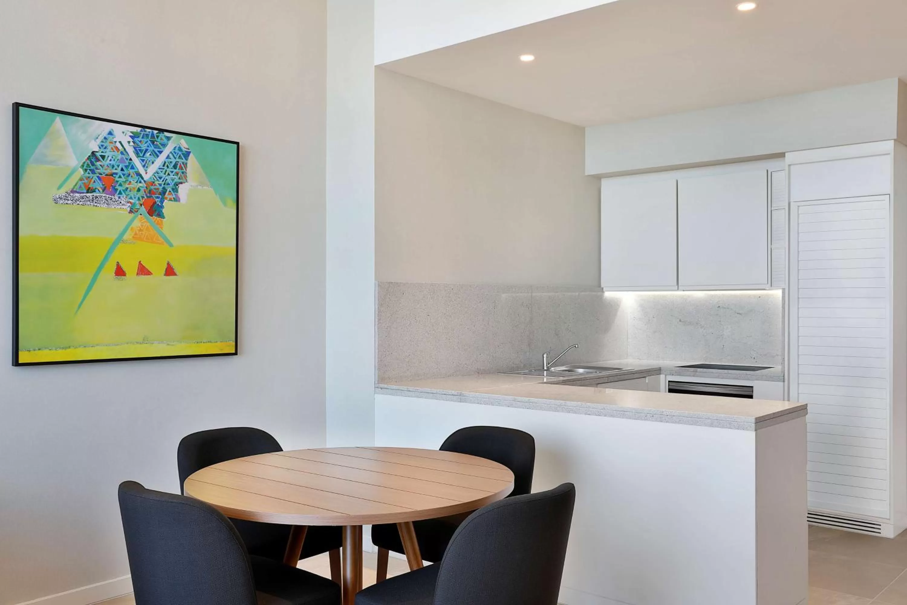 Kitchen or kitchenette in Aleph Doha Residences, Curio Collection By Hilton