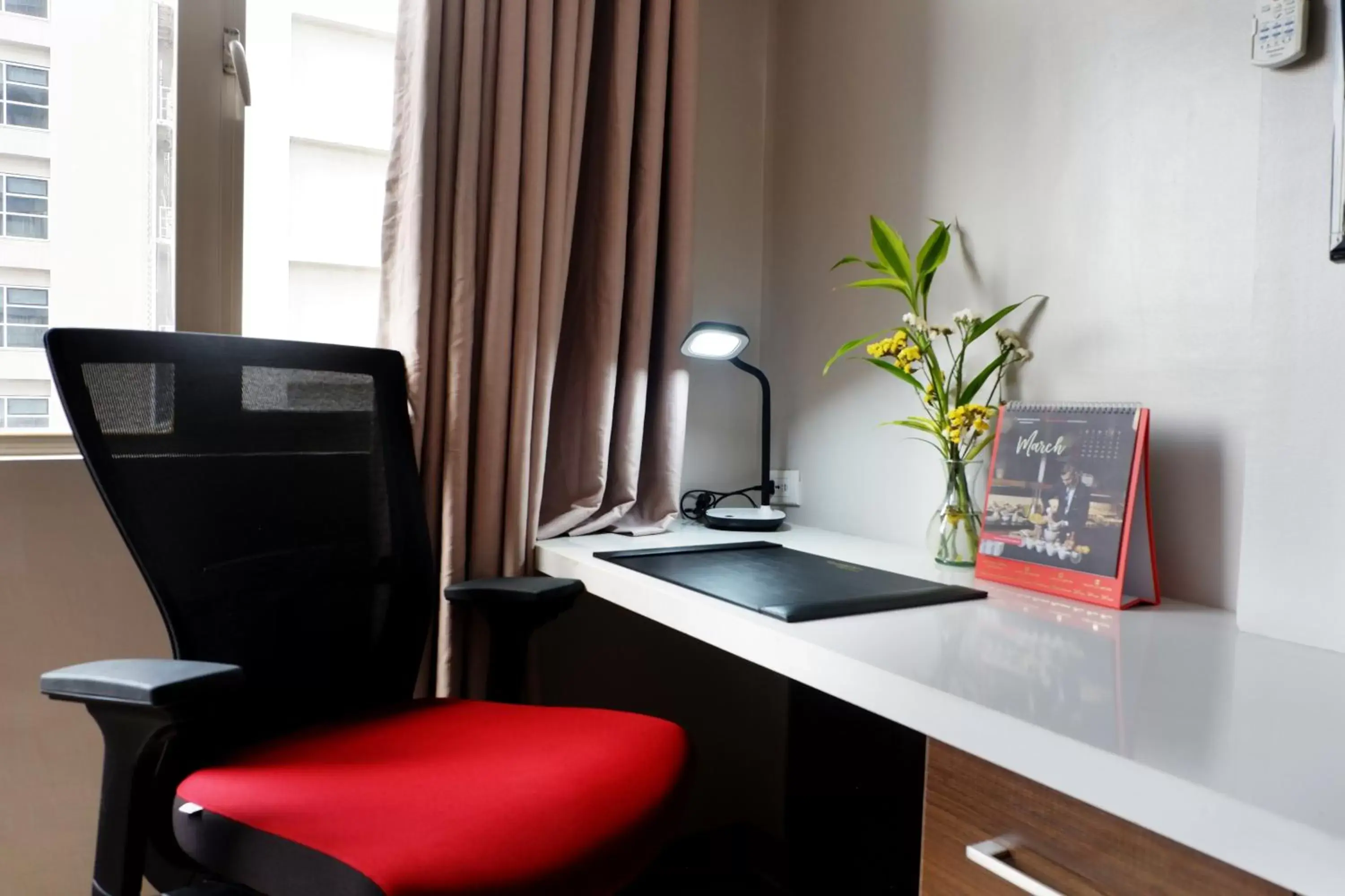 Living room, TV/Entertainment Center in Valero Grand Suites by Swiss-Belhotel