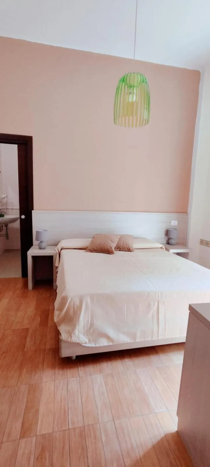 Bed in Il Quadrifoglio Room& Suite