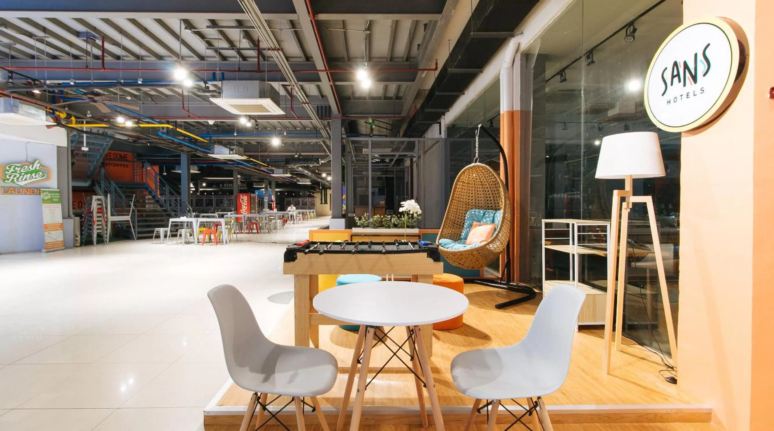 Seating area in Sans Hotel Laperal Manila