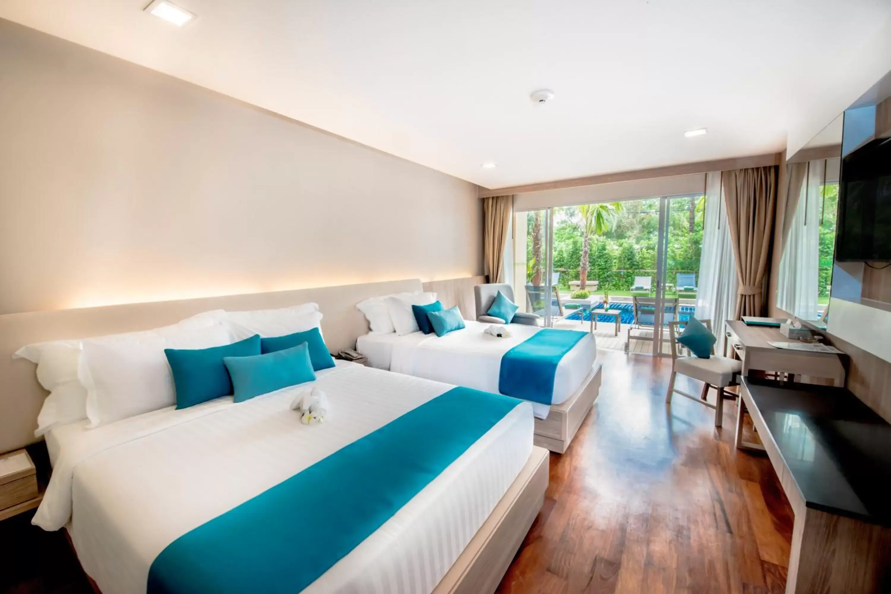 Bedroom in Phuket Graceland Resort and Spa - SHA Extra Plus