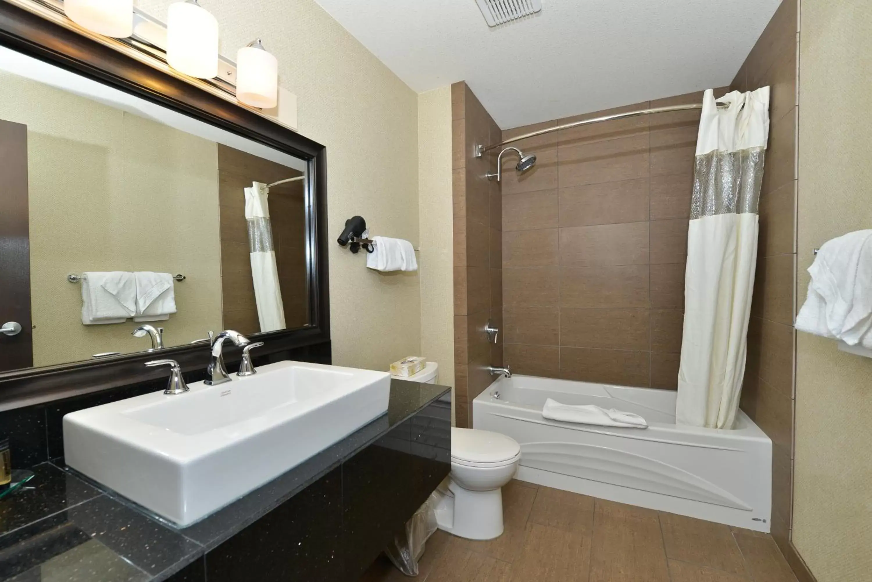 Bathroom in Prestige Vernon Hotel