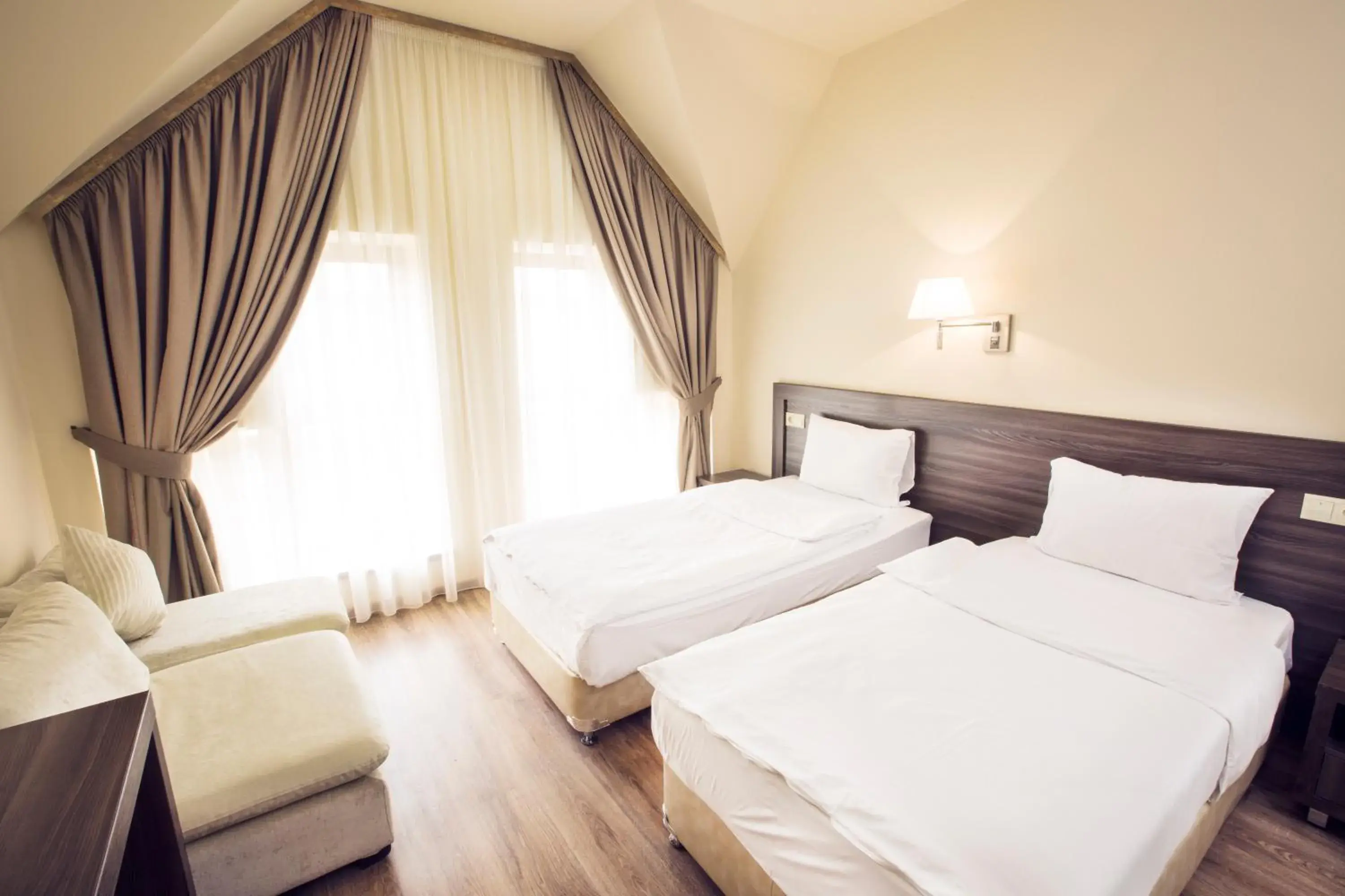 Bed in Yerevan Deluxe Hotel