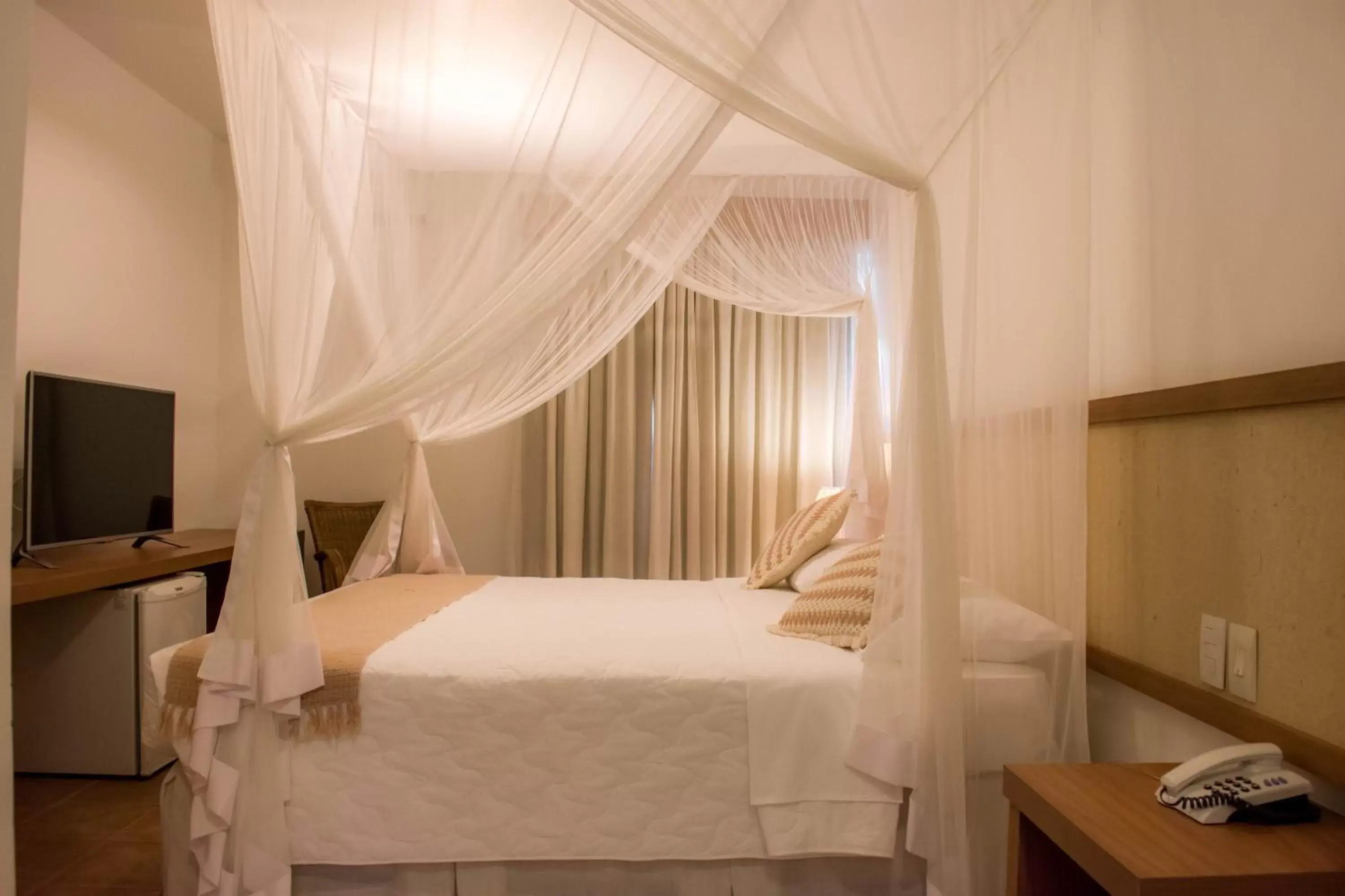 Bed in Sarana Praia Hotel