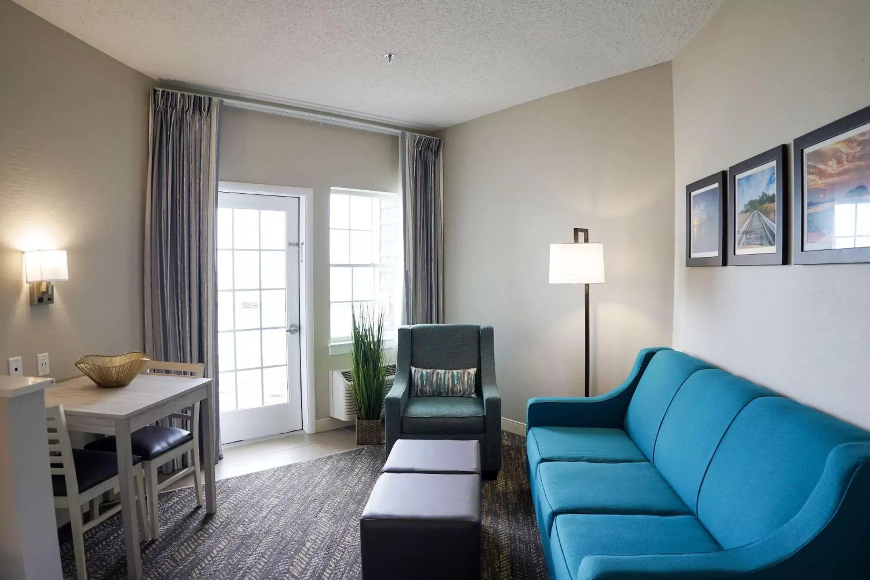 Photo of the whole room, Seating Area in Comfort Suites Chincoteague Island Bayfront Resort