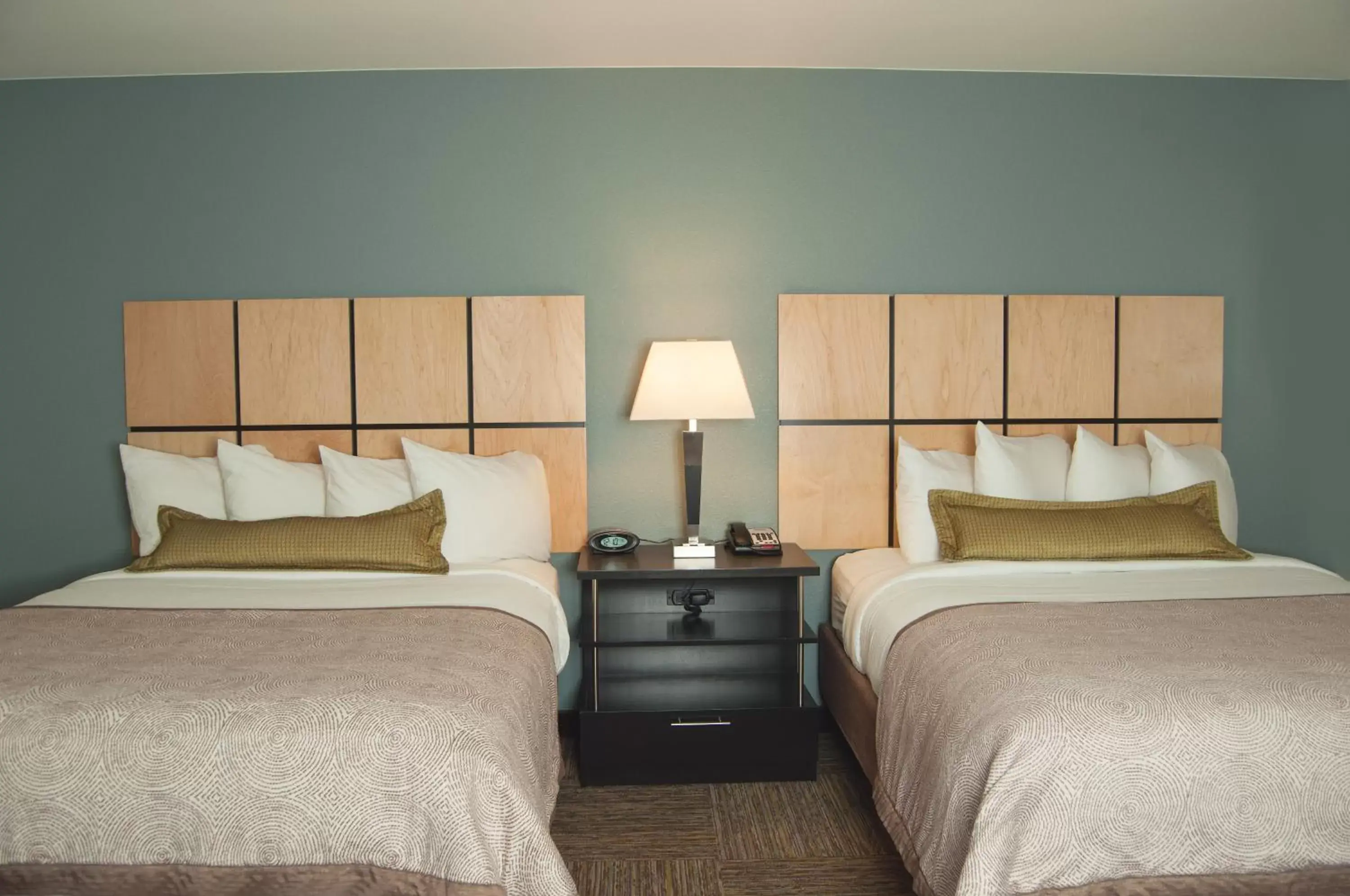 Bed in Candlewood Suites Fort Collins, an IHG Hotel