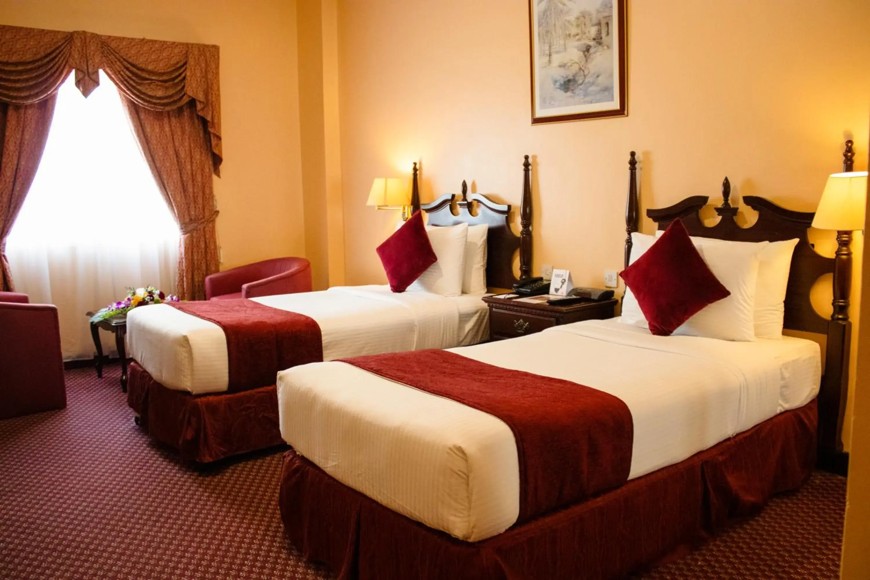 Bed in Delmon International Hotel