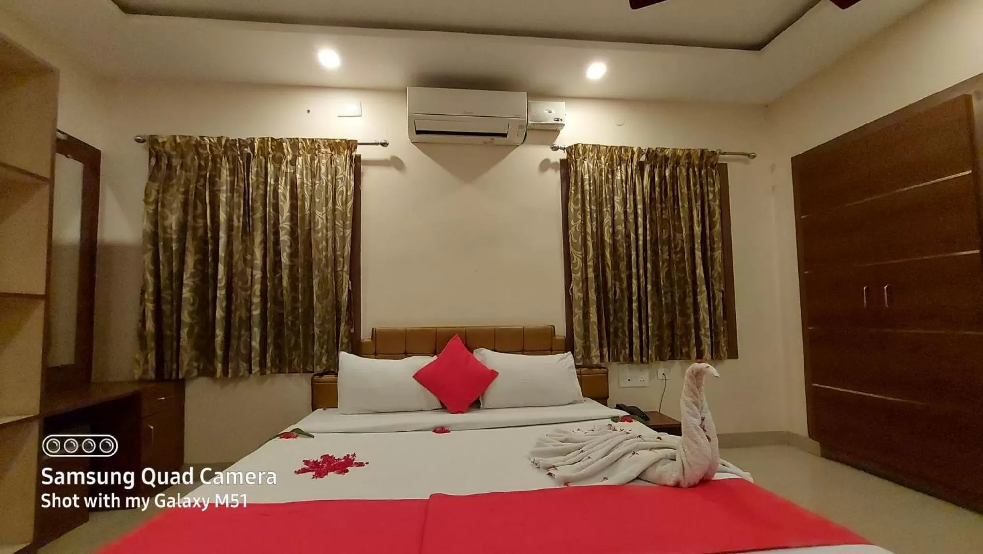 Bed in Sri Kamadhenu Residency