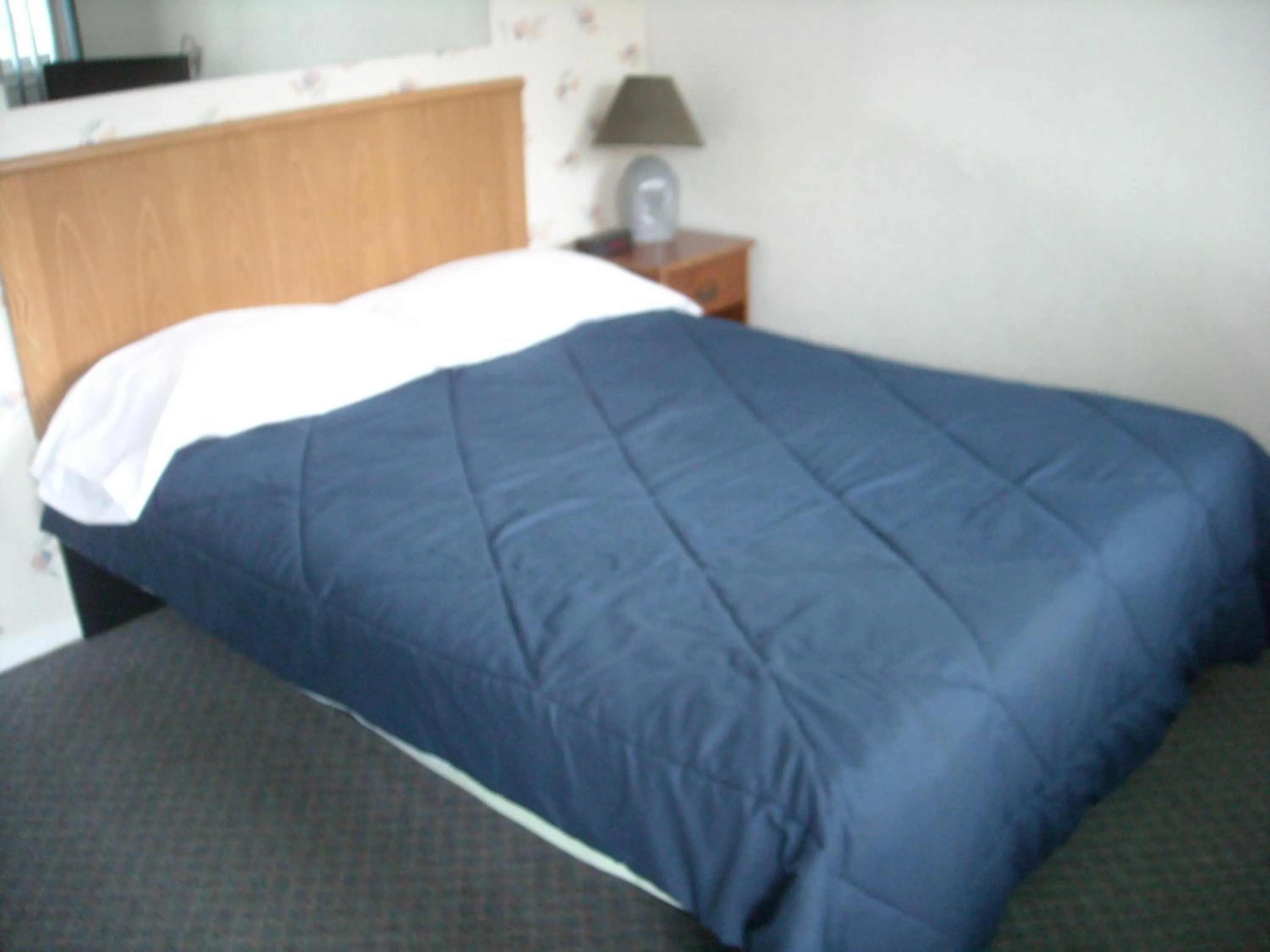 Bed in Motel le Verseau