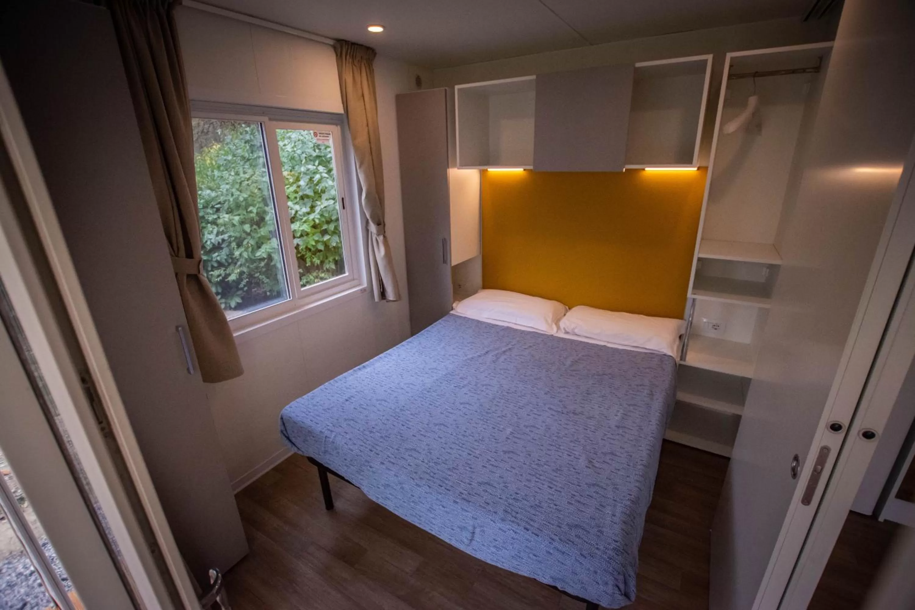 Bed in AgriCamping AlbaVillage Hotel & Wellness