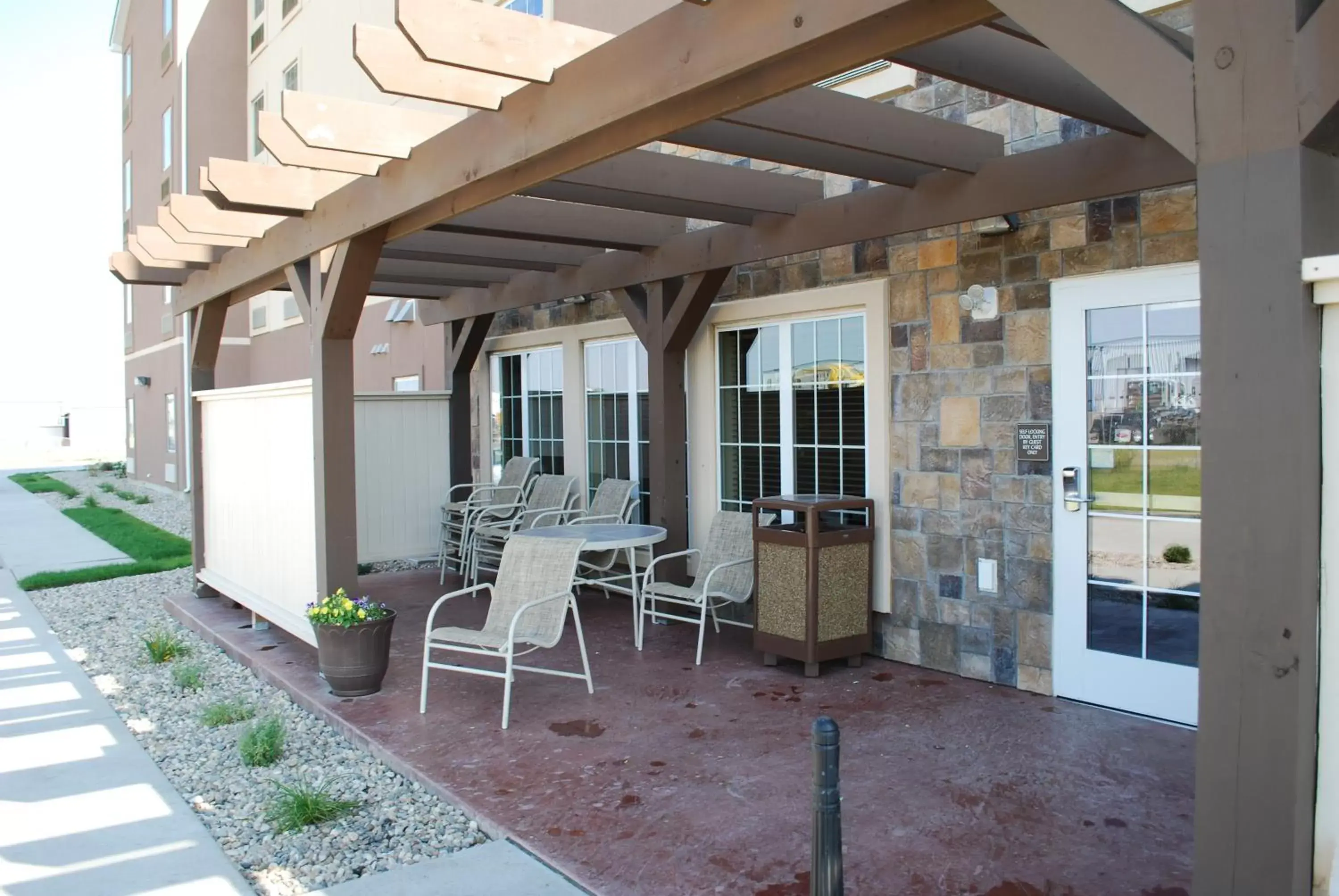 Property building, Patio/Outdoor Area in Landmark Suites - Williston