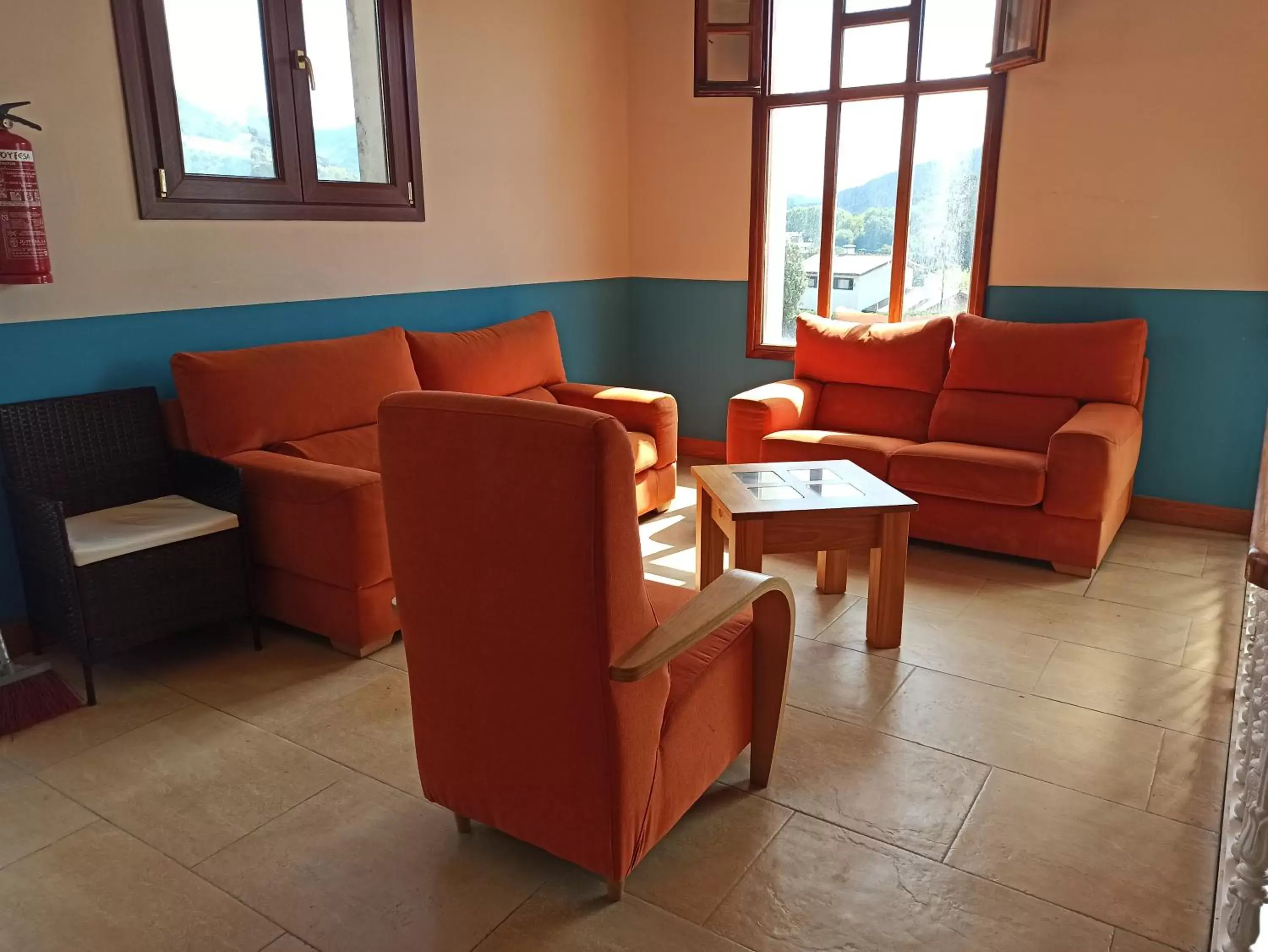 Seating Area in hotel gueñes